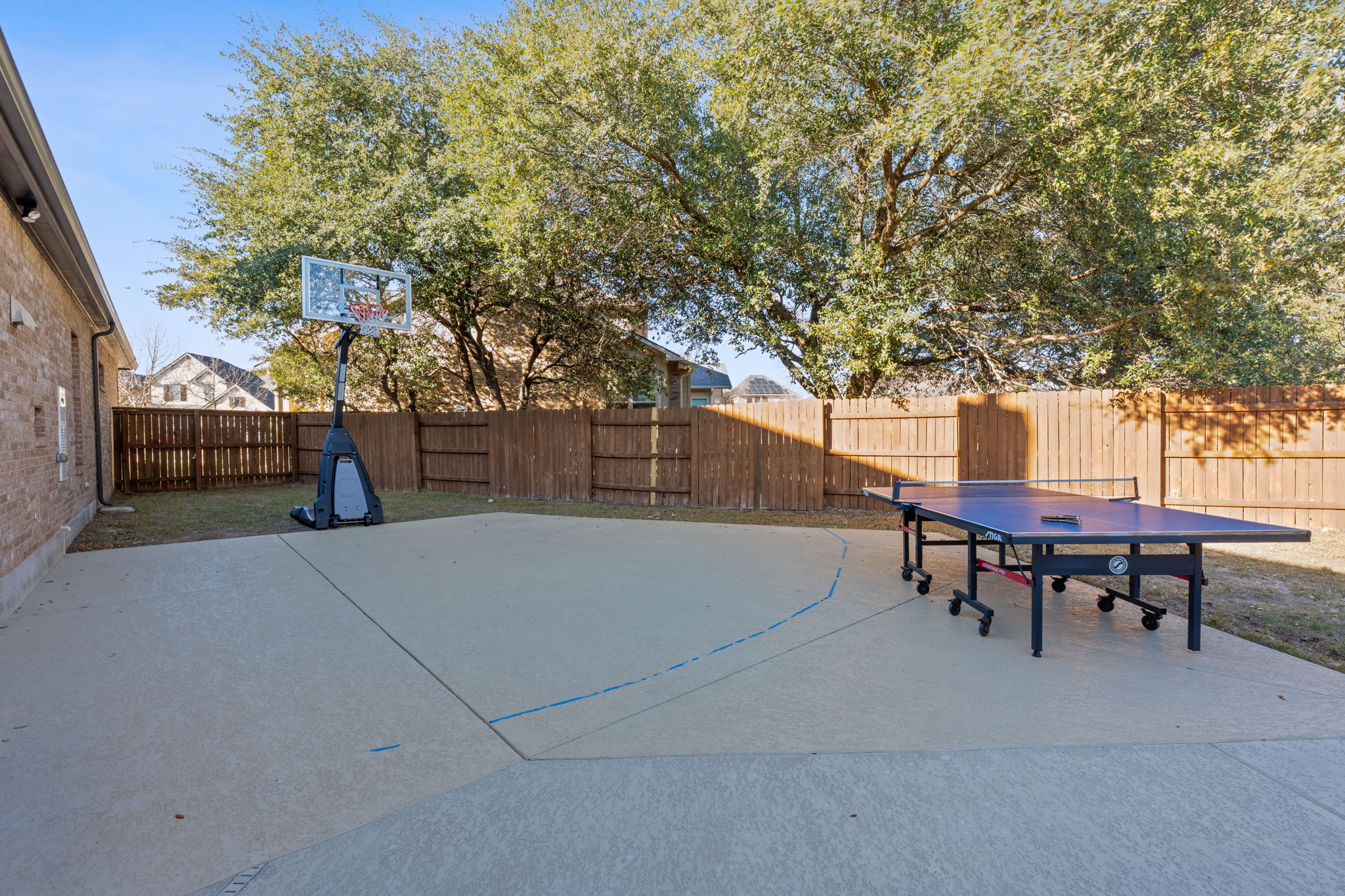 512 Choke Canyon Lane Georgetown, TX 78628 - Photo 34 of 37 Fenced backyard with a patio area