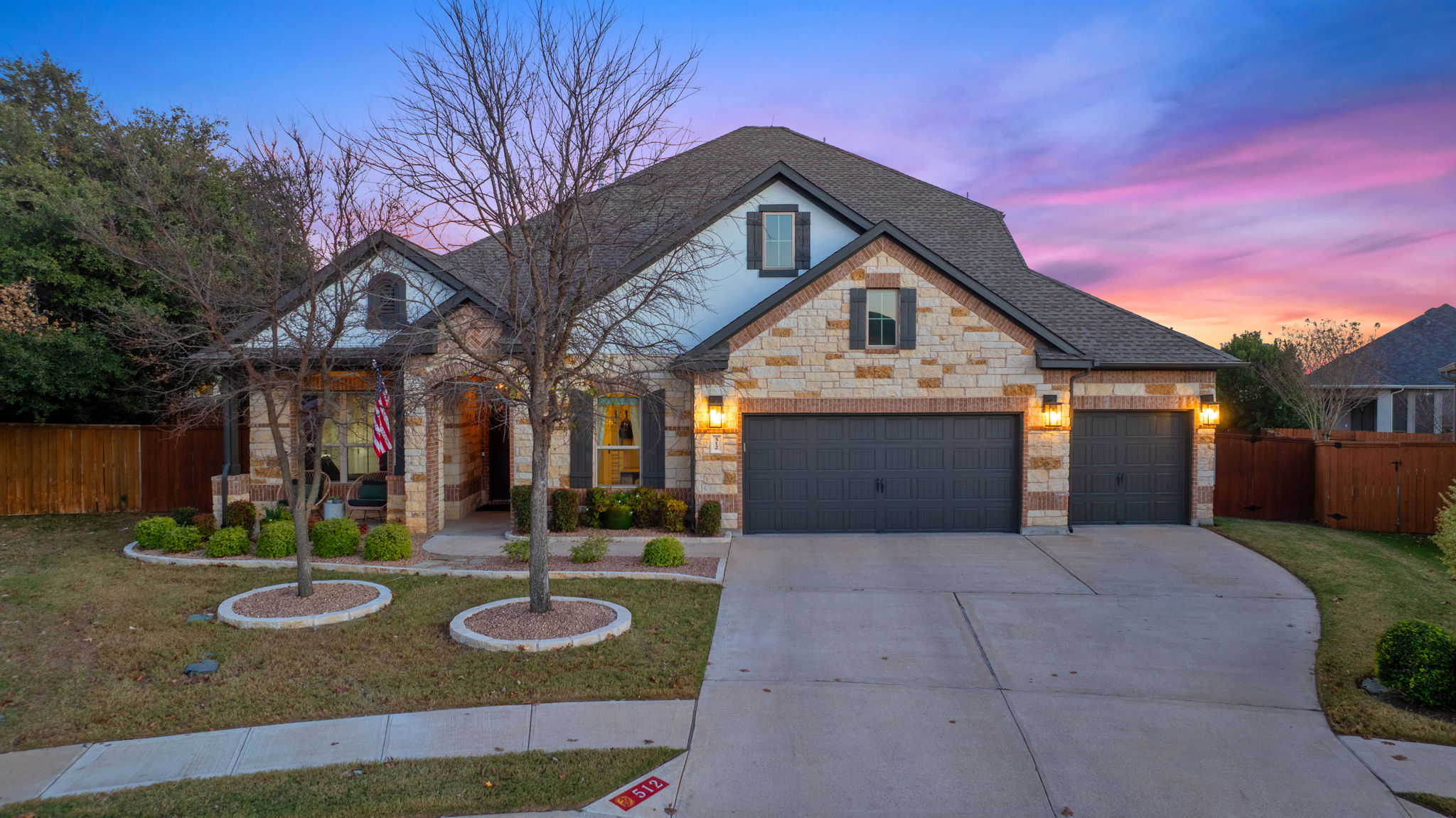 512 Choke Canyon Lane Georgetown, TX 78628 - Photo 37 of 37 View of front facade featuring driveway and stone siding