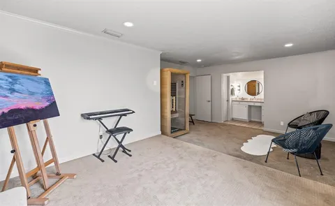 a workspace with furniture and a window