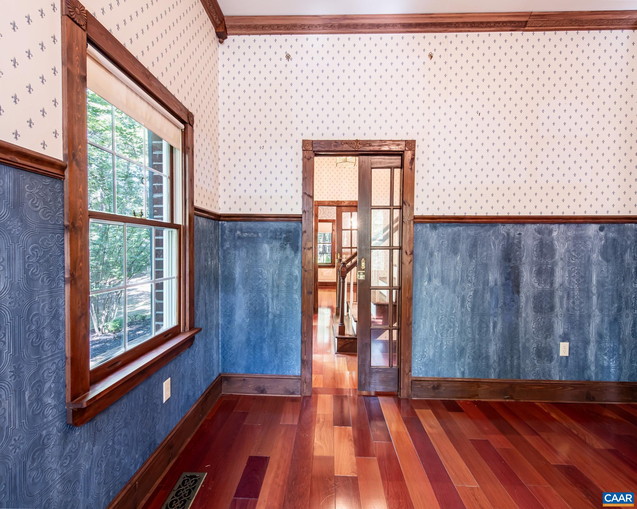 87 Retriever Ridge Drive Gordonsville, VA 22942 - Photo 14 of 41 a view of empty room with wooden floor and fan