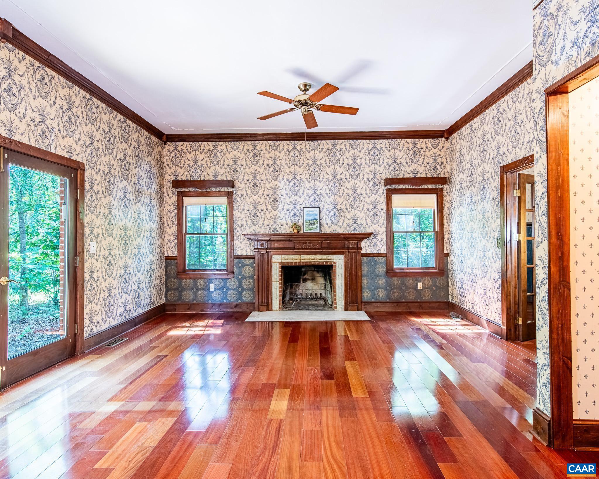 87 Retriever Ridge Drive Gordonsville, VA 22942 - Photo 16 of 41 a view of an empty room with a fireplace and a window