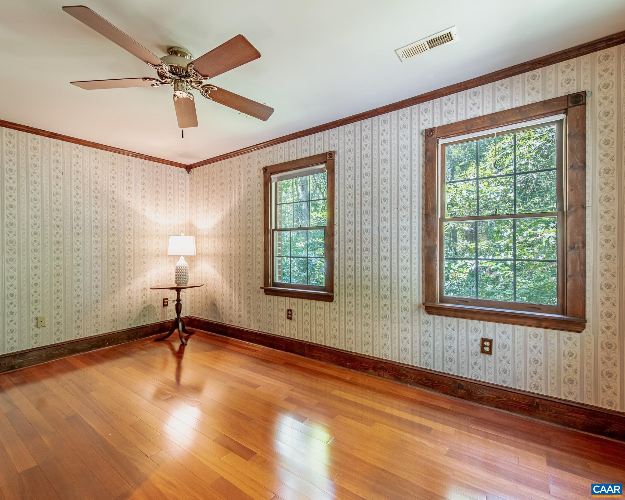 87 Retriever Ridge Drive Gordonsville, VA 22942 - Photo 24 of 41 a view of an empty room with a window and a ceiling fan
