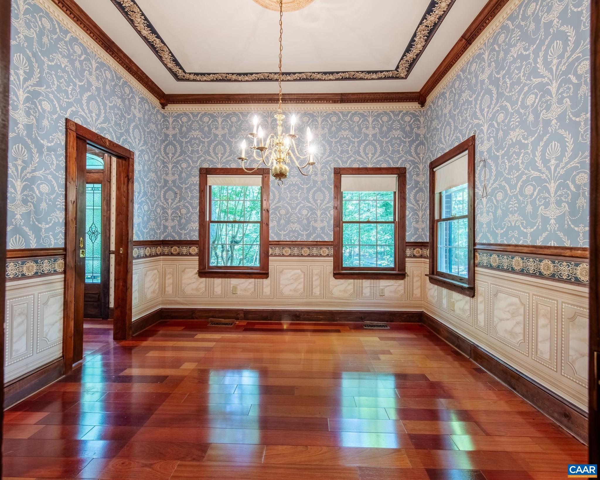 87 Retriever Ridge Drive Gordonsville, VA 22942 - Photo 7 of 41 a view of an entryway with wooden floor and windows