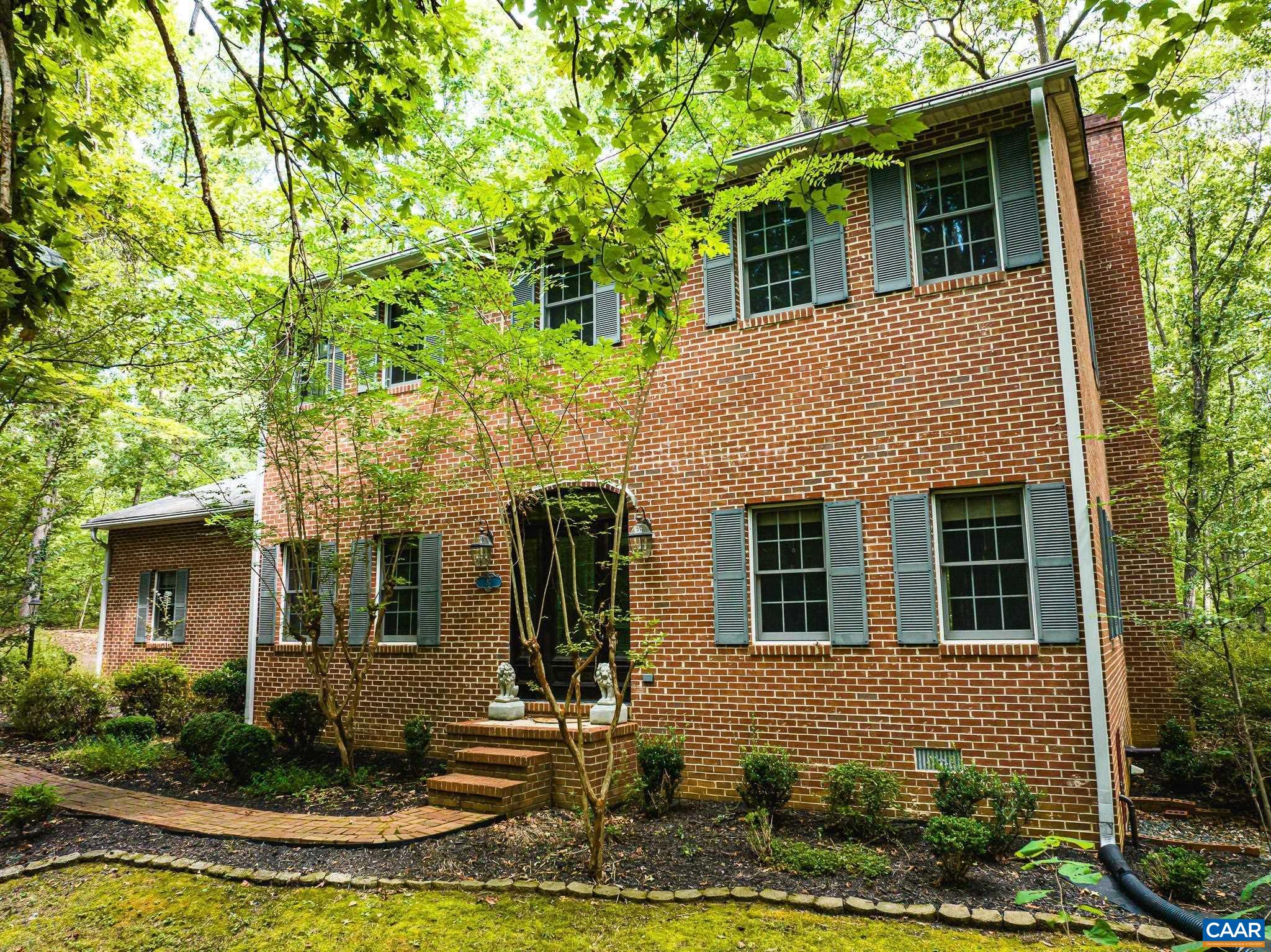 87 Retriever Ridge Drive Gordonsville, VA 22942 - Photo 10 of 41 a front view of a house with garden