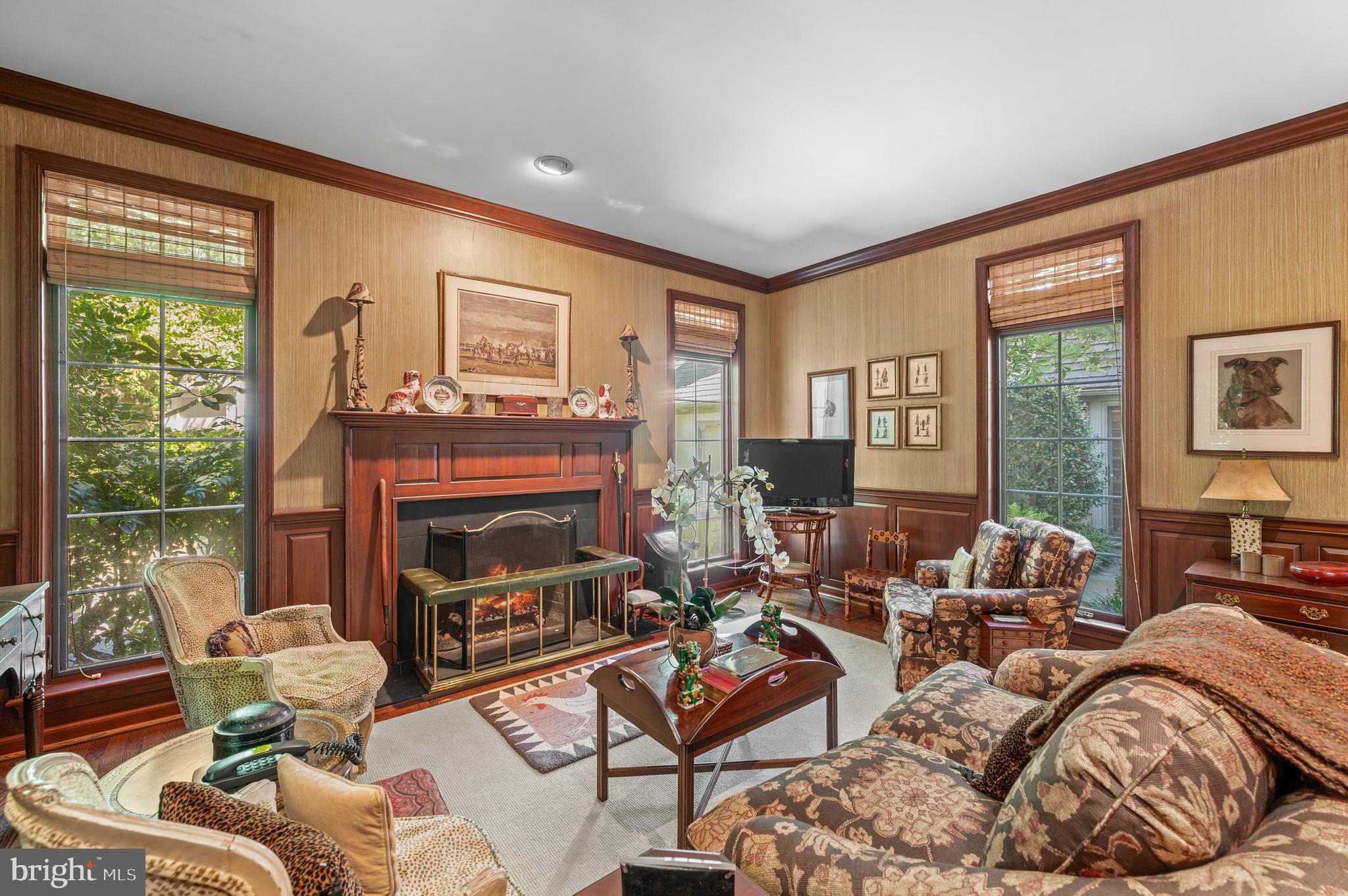 1236 Denbigh Lane Wayne, PA 19087 - Photo 12 of 36 a living room with furniture large window and a fireplace