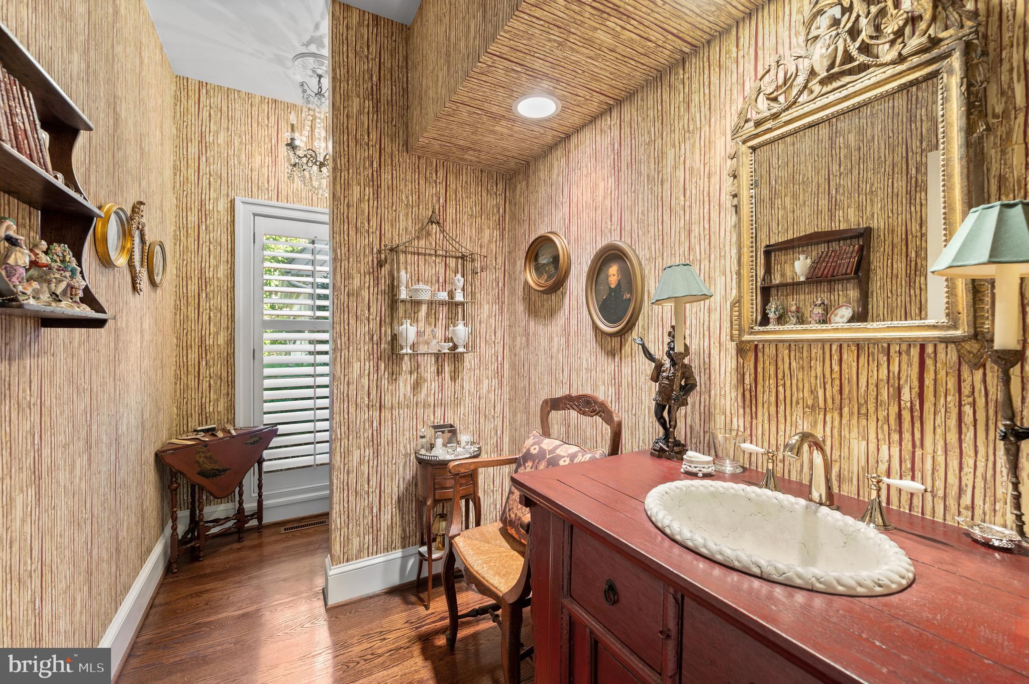 1236 Denbigh Lane Wayne, PA 19087 - Photo 14 of 36 a bathroom with a sink a mirror and a toilet