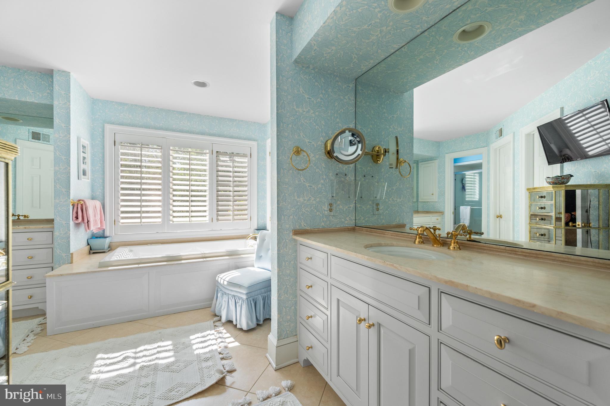 1236 Denbigh Lane Wayne, PA 19087 - Photo 25 of 36 a bathroom with a granite countertop sink a toilet and bathtub