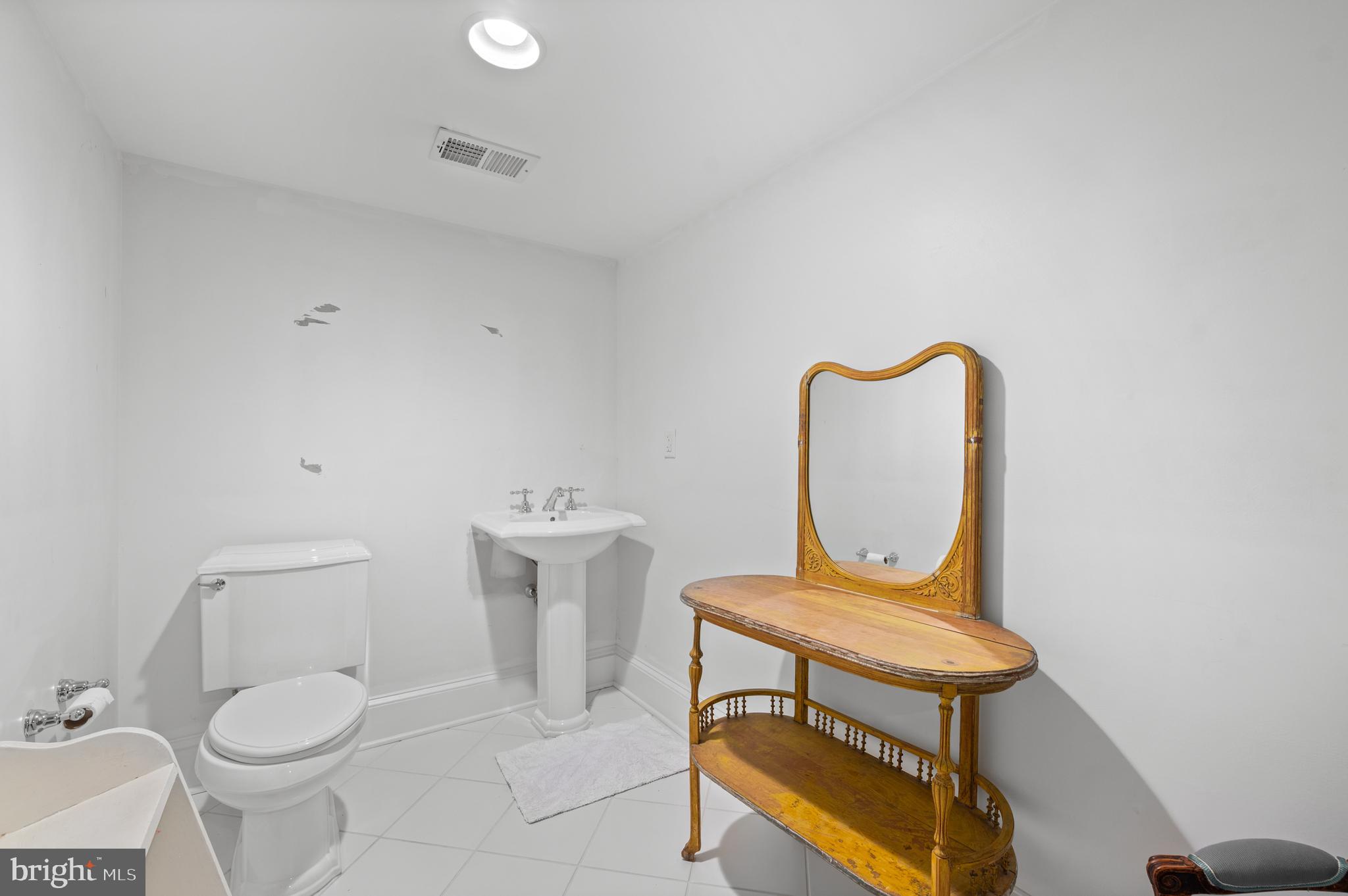1236 Denbigh Lane Wayne, PA 19087 - Photo 34 of 36 a bathroom with a toilet and a sink