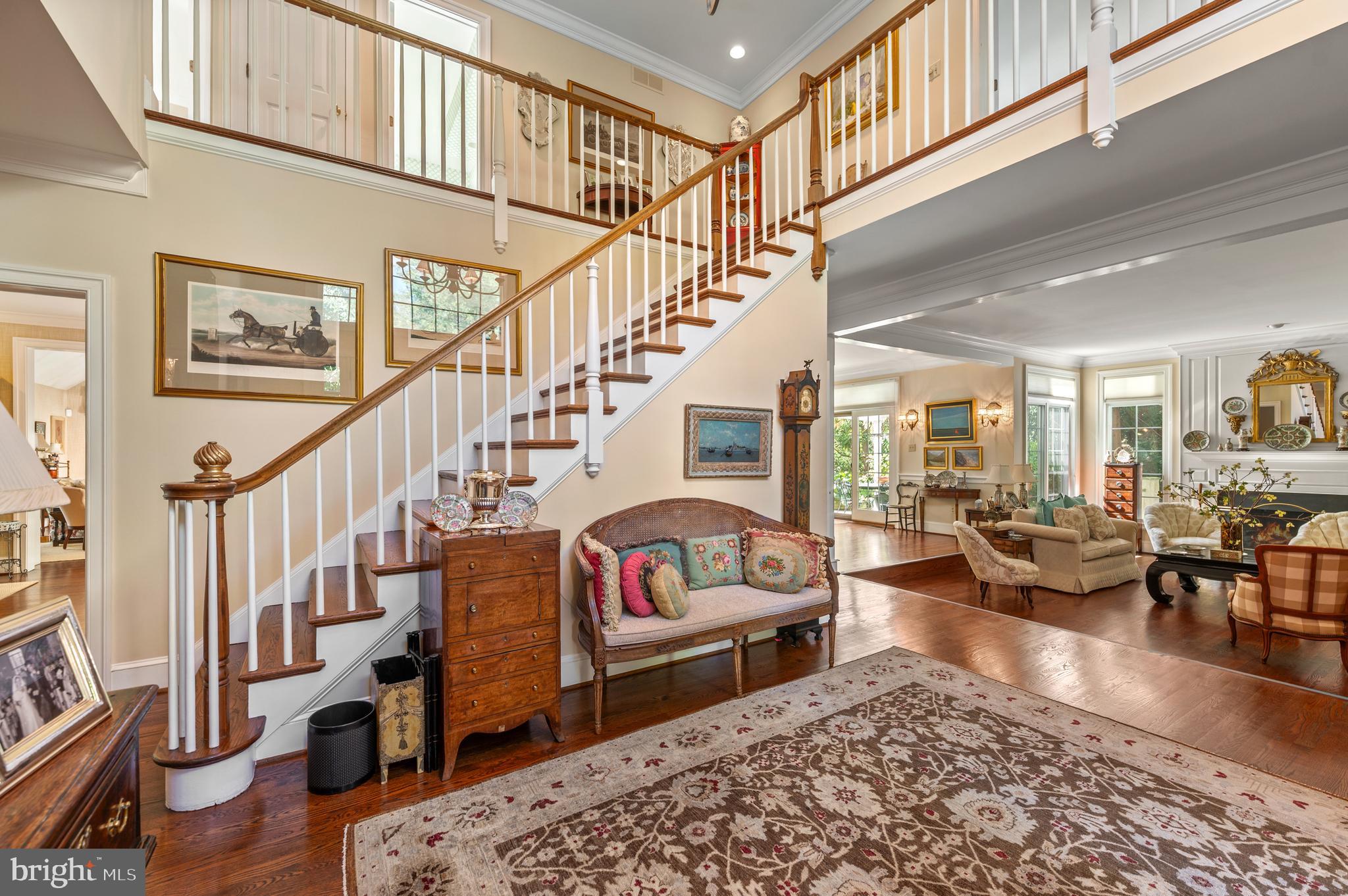 1236 Denbigh Lane Wayne, PA 19087 - Photo 6 of 36 a living room with furniture or stairs and a wooden floor