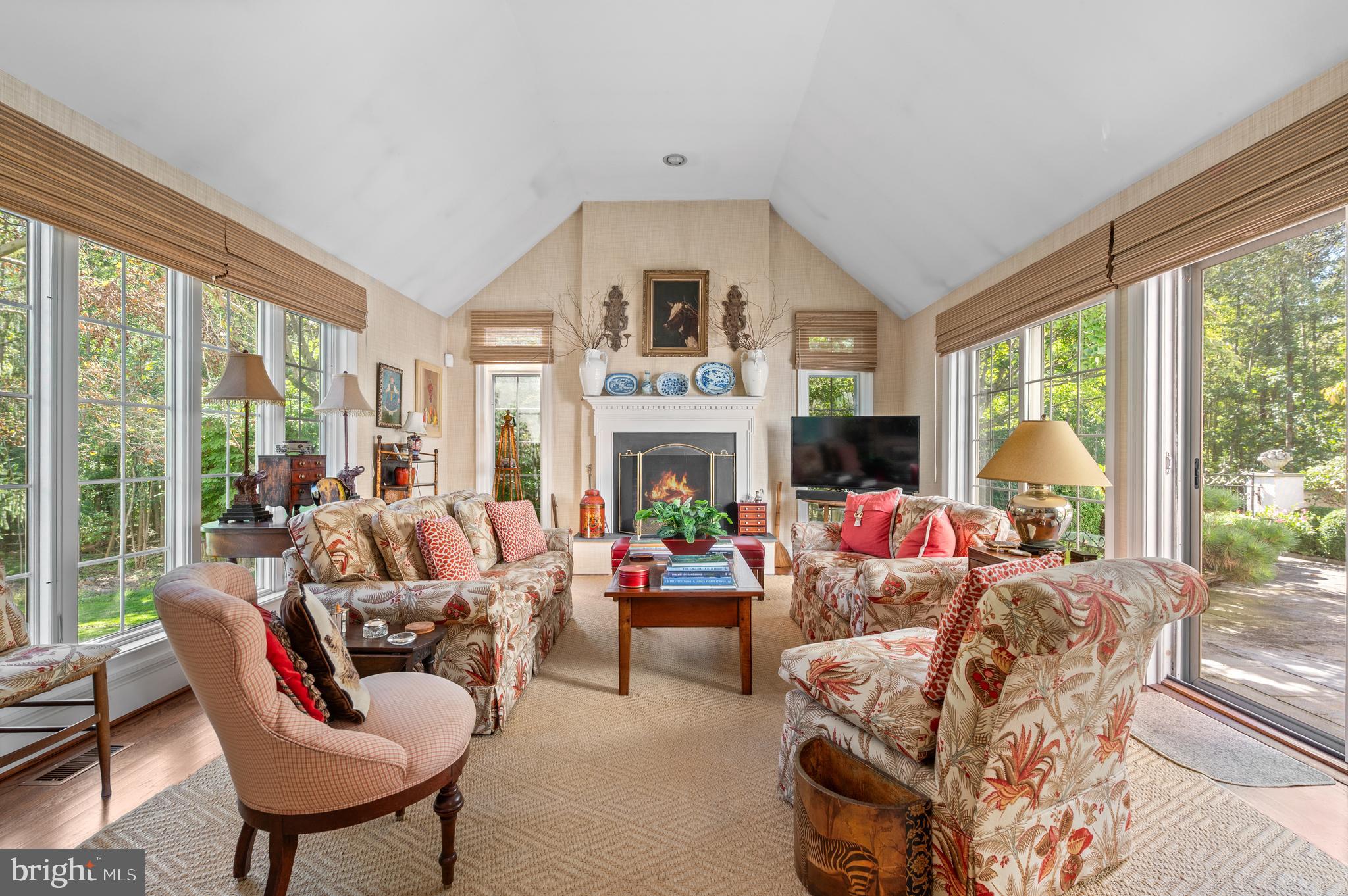1236 Denbigh Lane Wayne, PA 19087 - Photo 9 of 36 a living room with furniture fireplace and large windows