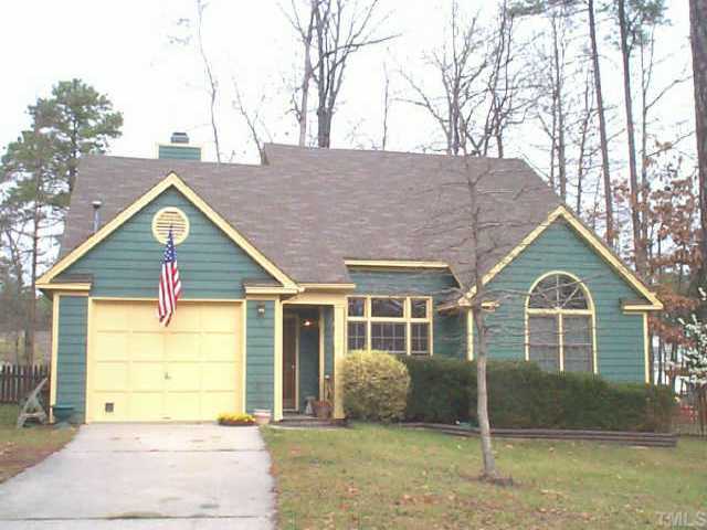 11908 North Exeter Way Raleigh, NC 27613 - Photo 1 of 1 a view of house with a yard