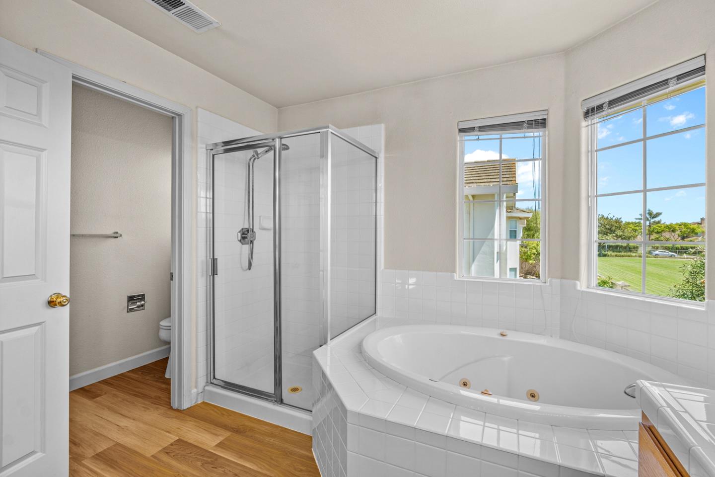215 Montclair Lane Salinas, CA 93906 - Photo 22 of 40 a bathroom with a tub shower and window