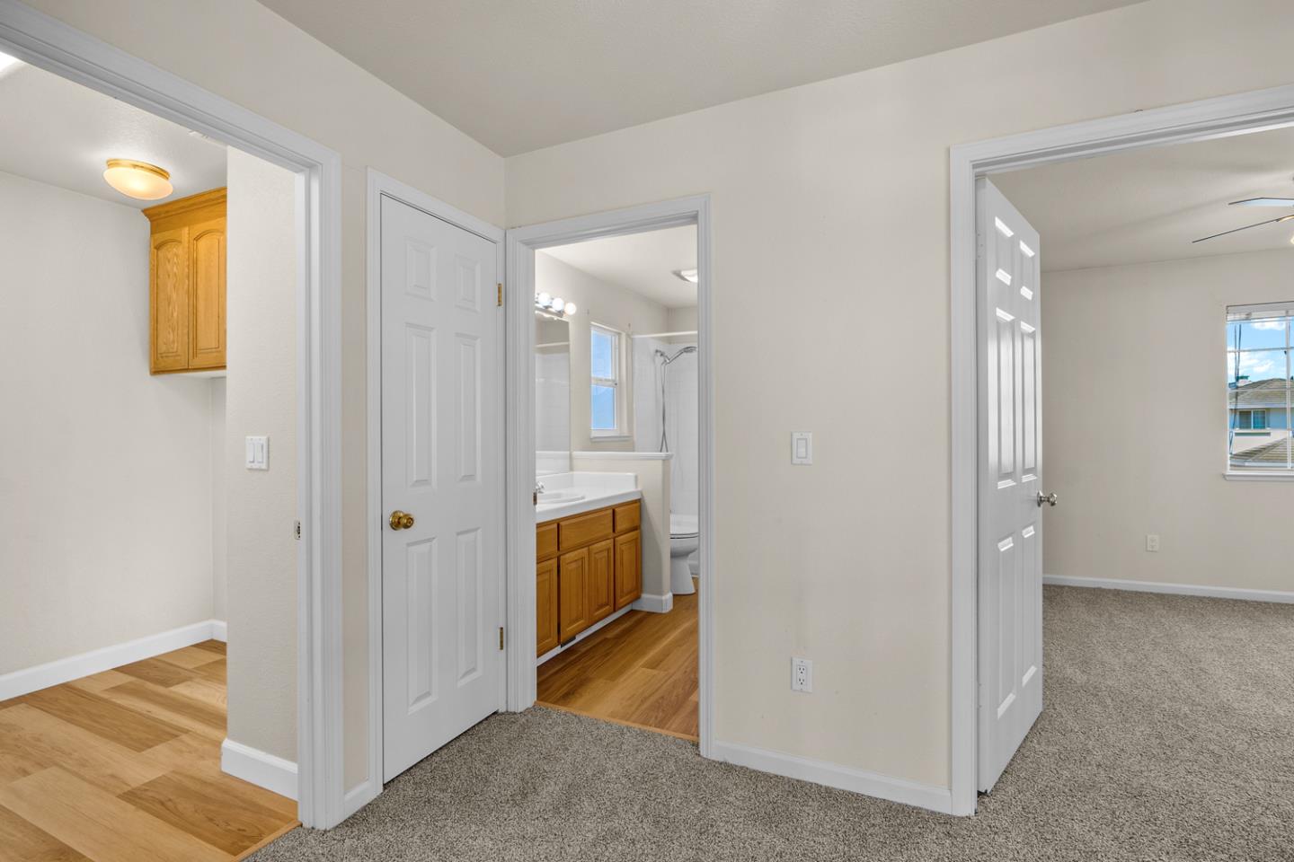 215 Montclair Lane Salinas, CA 93906 - Photo 24 of 40 a view of a hallway with wooden floor and a living room