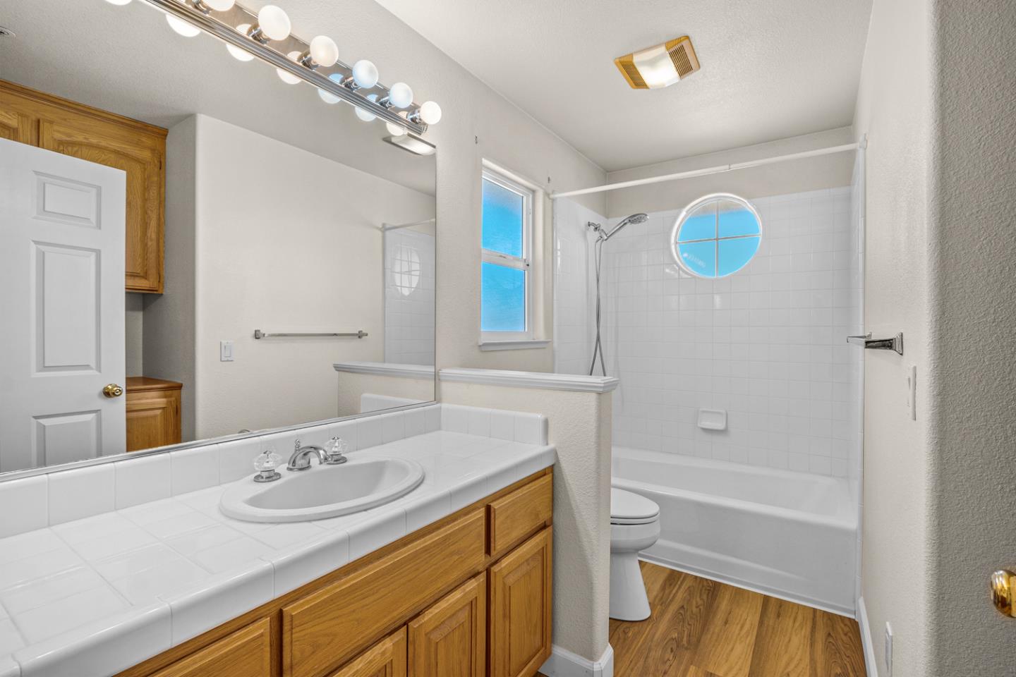 215 Montclair Lane Salinas, CA 93906 - Photo 25 of 40 a bathroom with a sink a toilet and shower