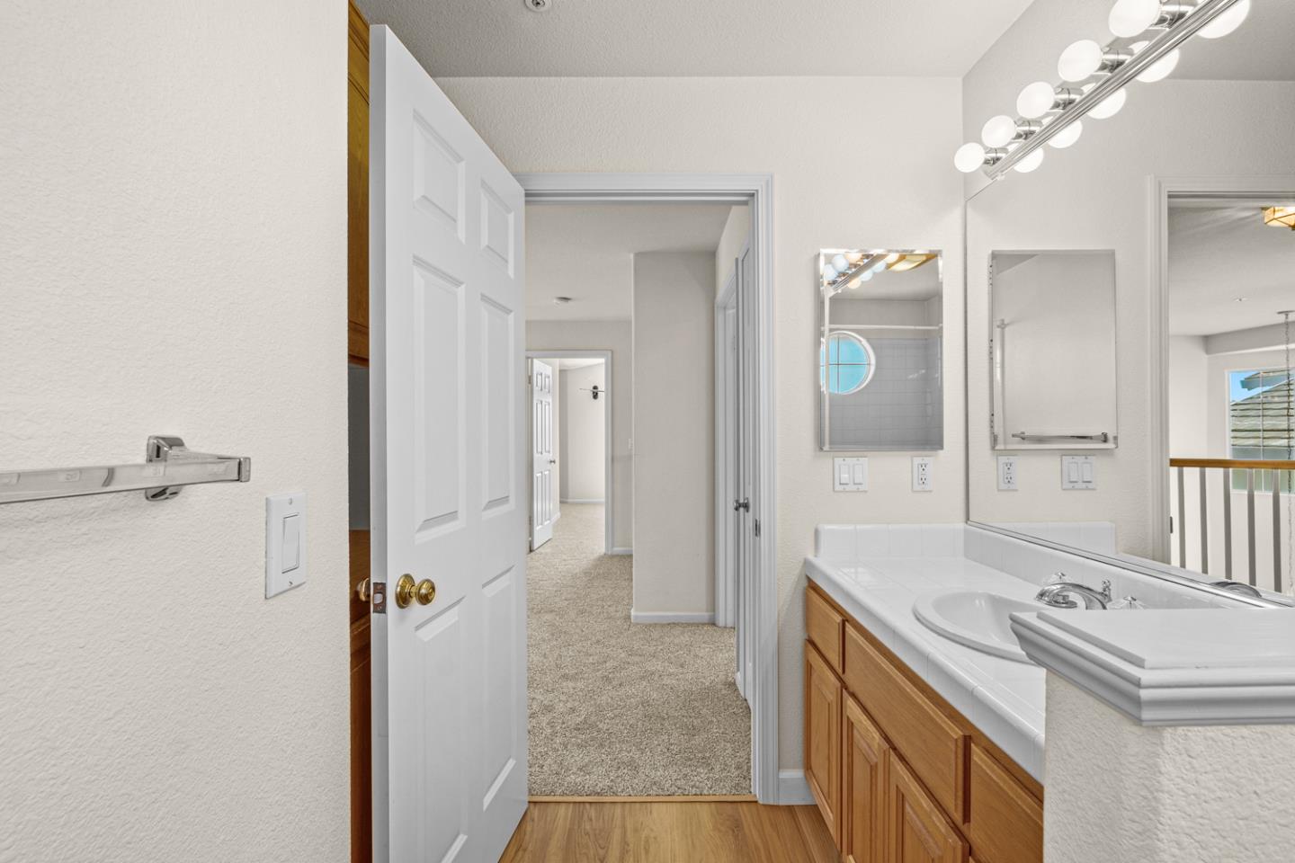 215 Montclair Lane Salinas, CA 93906 - Photo 26 of 40 a bathroom with a sink a mirror and a shower