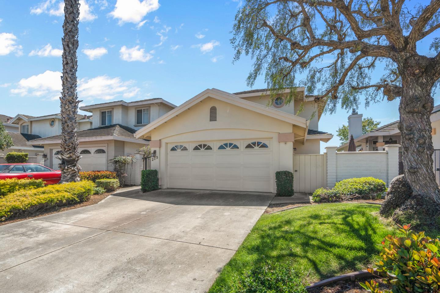 215 Montclair Lane Salinas, CA 93906 - Photo 4 of 40 a front view of a house with a garden and trees