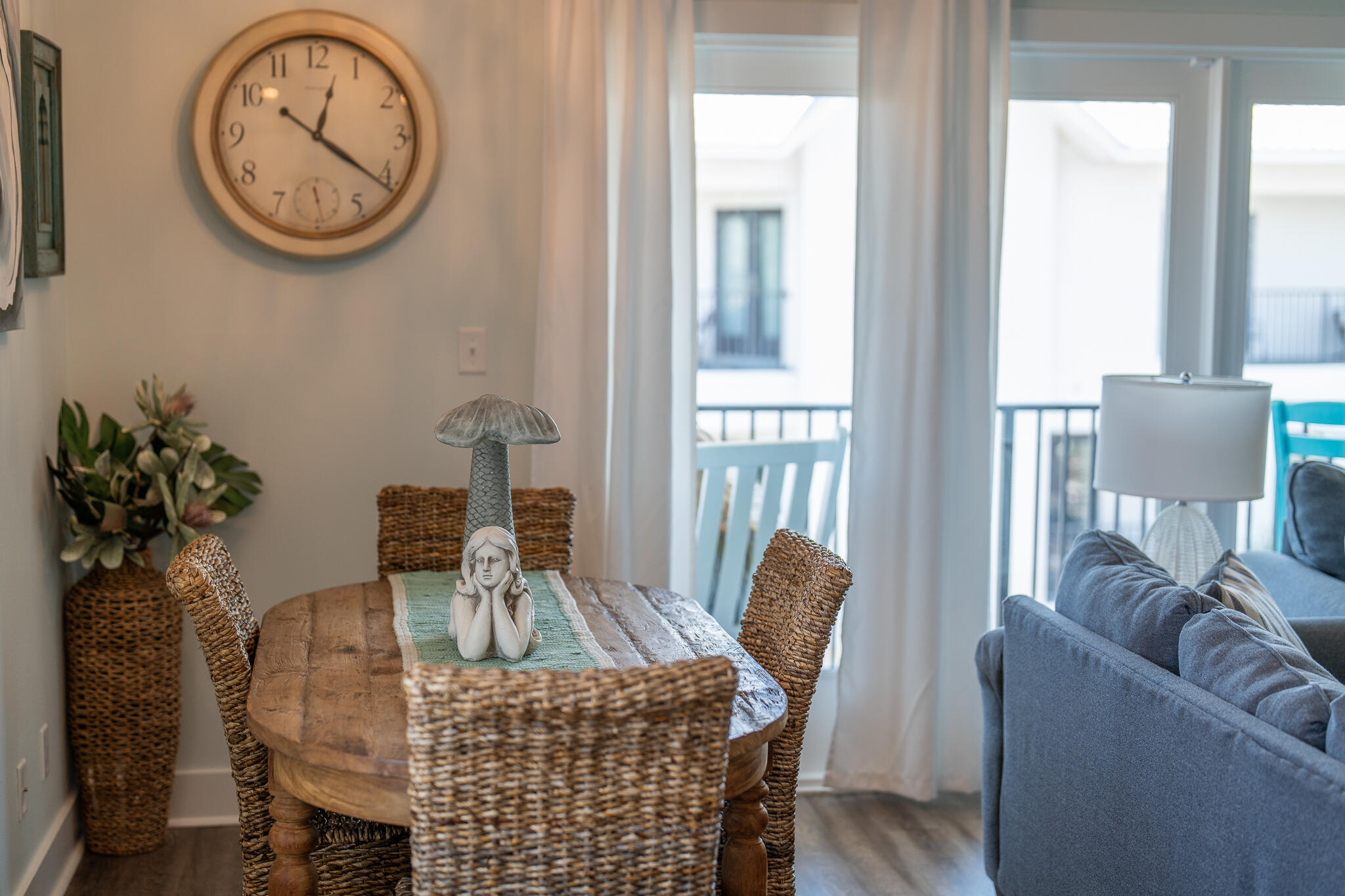 3986 West Hidden Lake Way, Unit 231 Santa Rosa Beach, FL 32459 - Photo 11 of 66 a view of a dining room with furniture window and wooden floor