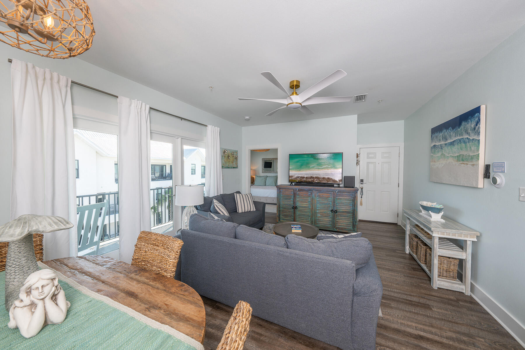 3986 West Hidden Lake Way, Unit 231 Santa Rosa Beach, FL 32459 - Photo 13 of 66 a living room with furniture and a large window