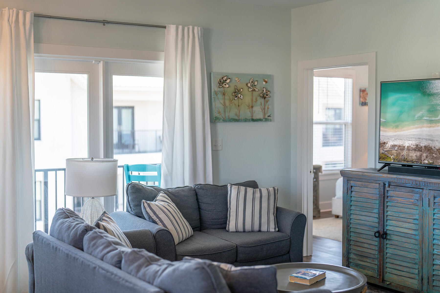 3986 West Hidden Lake Way, Unit 231 Santa Rosa Beach, FL 32459 - Photo 14 of 66 a living room with furniture and a window