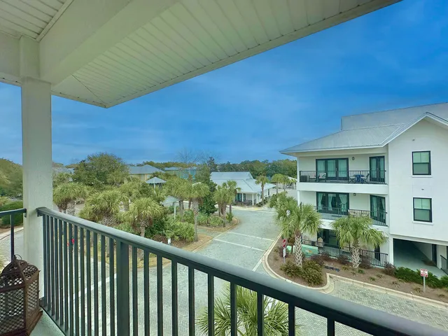 a kitchen with granite countertop a sink and cabinets