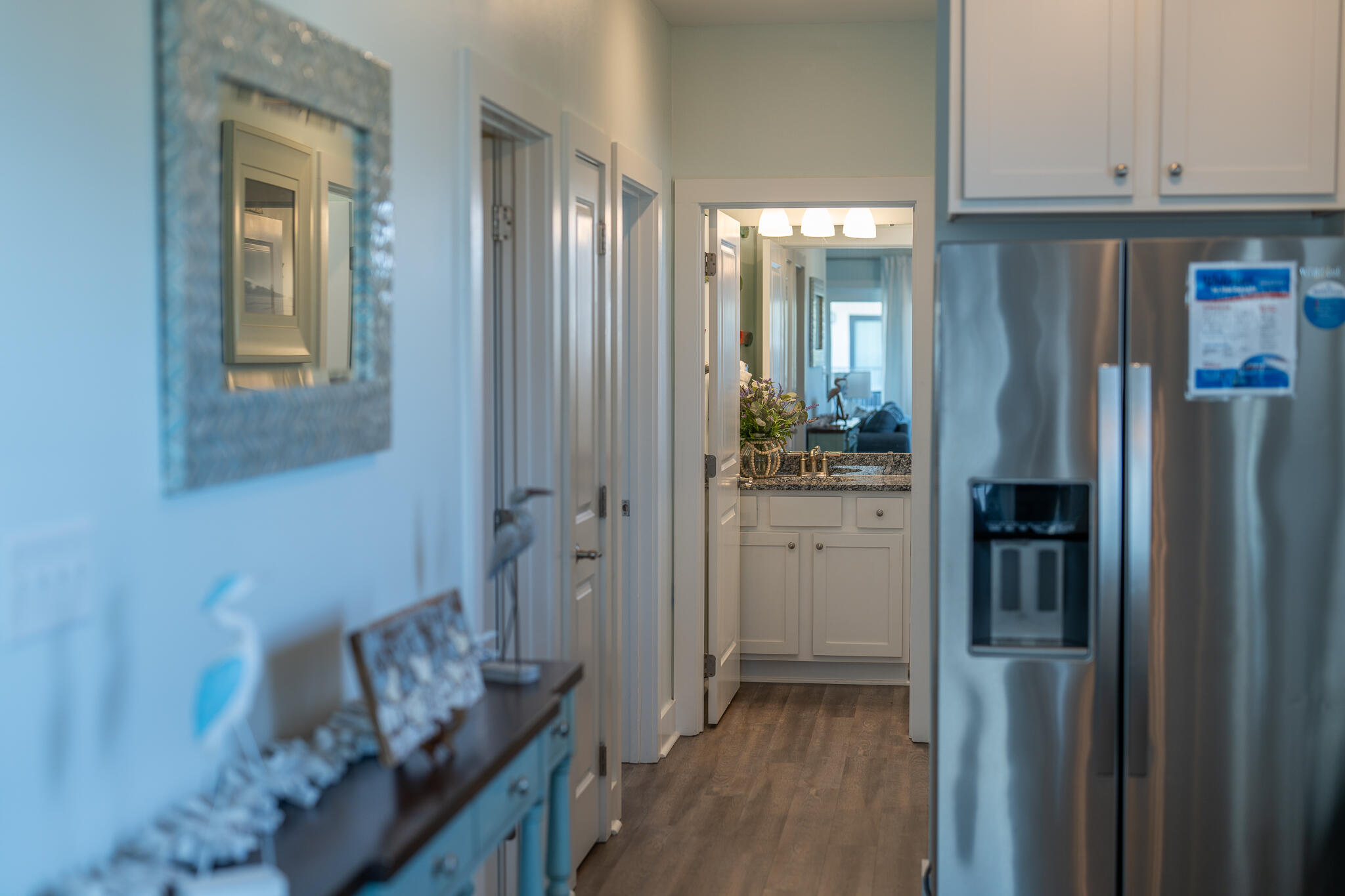 3986 West Hidden Lake Way, Unit 231 Santa Rosa Beach, FL 32459 - Photo 30 of 66 a kitchen with refrigerator and cabinets