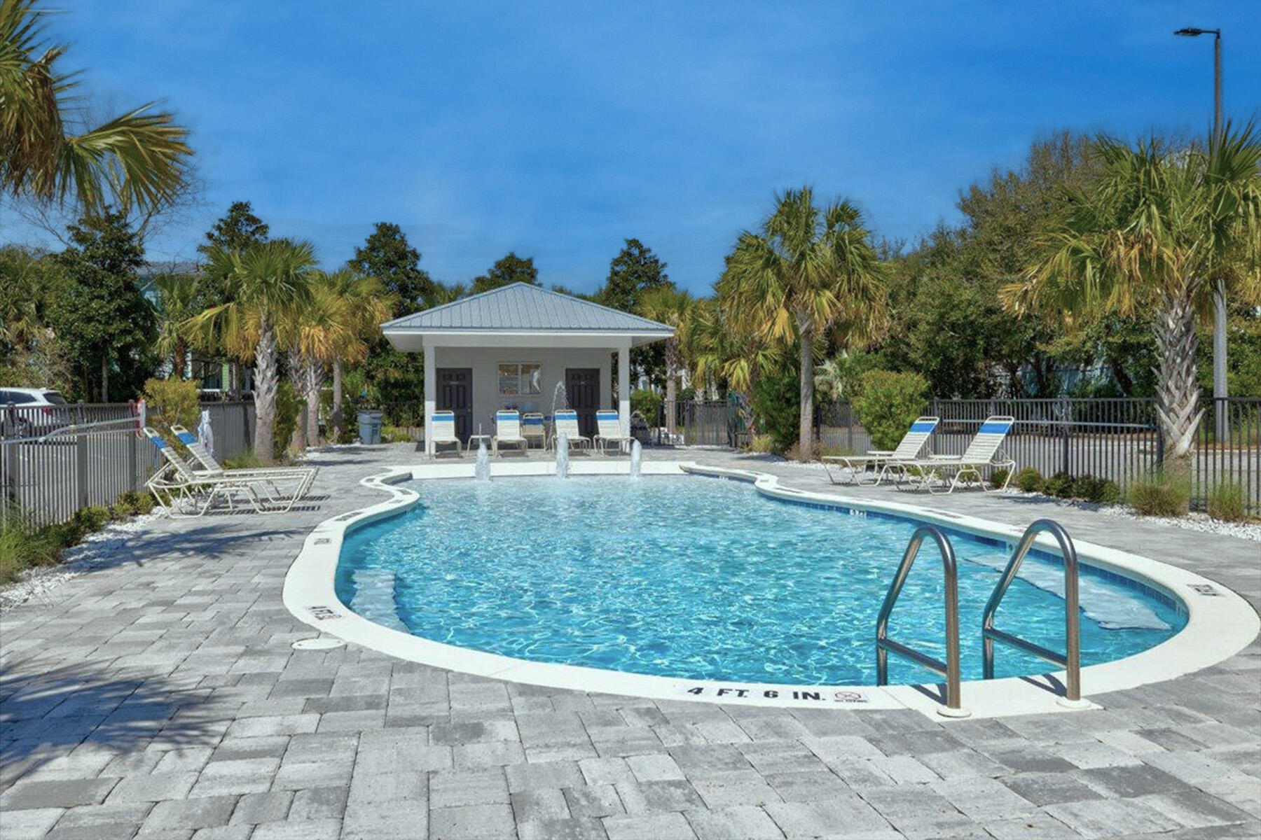 3986 West Hidden Lake Way, Unit 231 Santa Rosa Beach, FL 32459 - Photo 41 of 66 a view of a swimming pool with a patio
