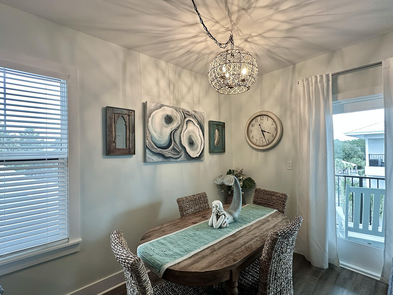 3986 West Hidden Lake Way, Unit 231 Santa Rosa Beach, FL 32459 - Photo 9 of 66 a dining room with wooden table and a window