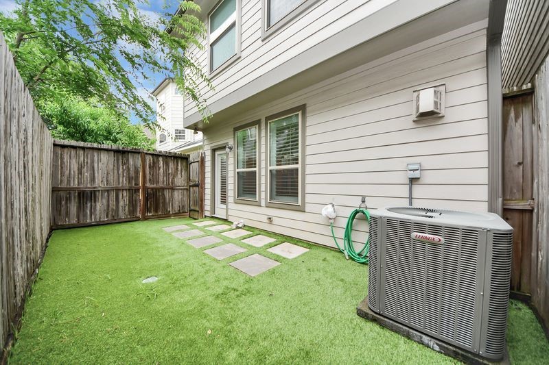 4222 Drake Street Houston, TX 77005 - Photo 28 of 28 a backyard of a house with seating space