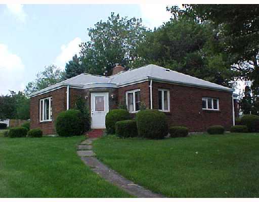 Exterior Front. BRICK EXTERIOR.  HOME SITS OFF ROAD AND NICE LEVEL REAR YARD