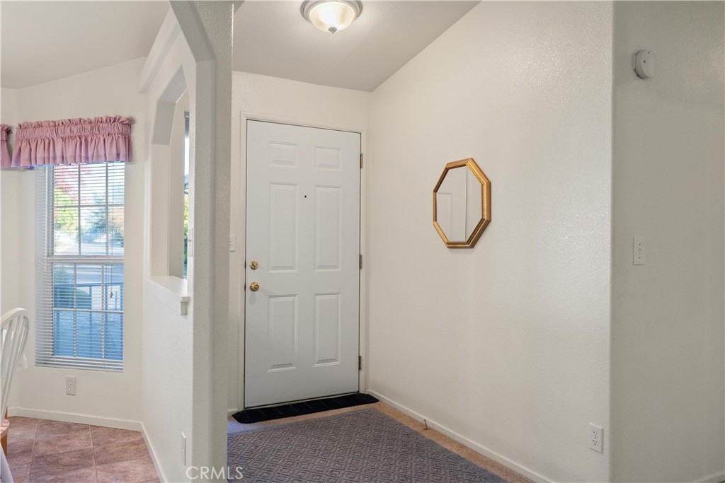 2050 Springfield Drive, Unit 143 Chico, CA 95928 - Photo 5 of 43 a view of a room with rack on the wall
