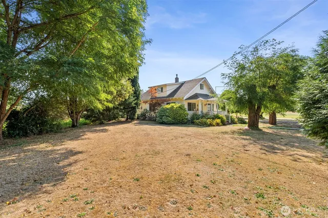 a house with trees in front of it