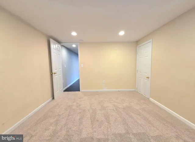 a house that is sitting in the grass