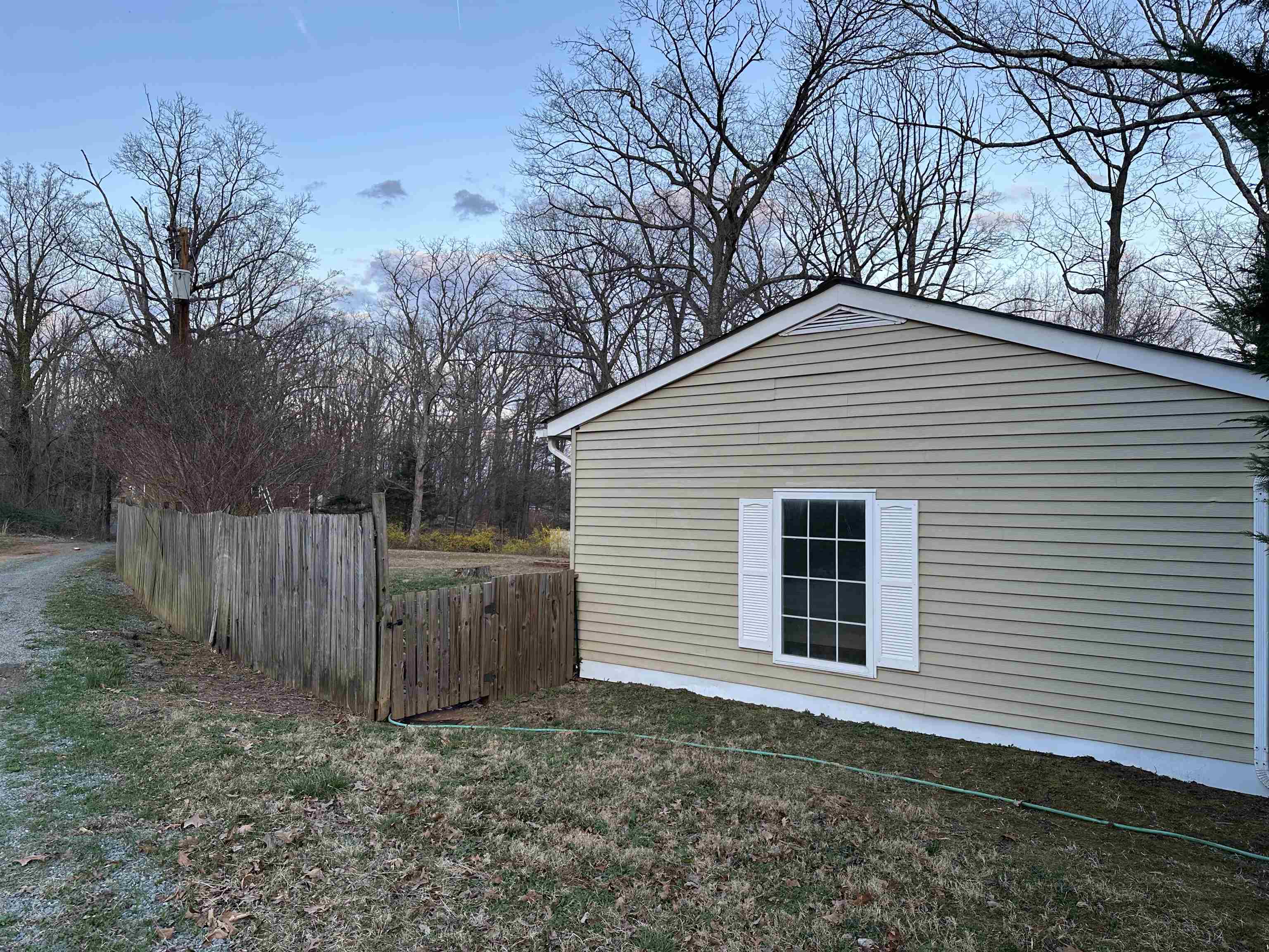 815 Beagle Gap Road Crozet, VA 22932 - Photo 3 of 18 a view of backyard of house with wooden fence