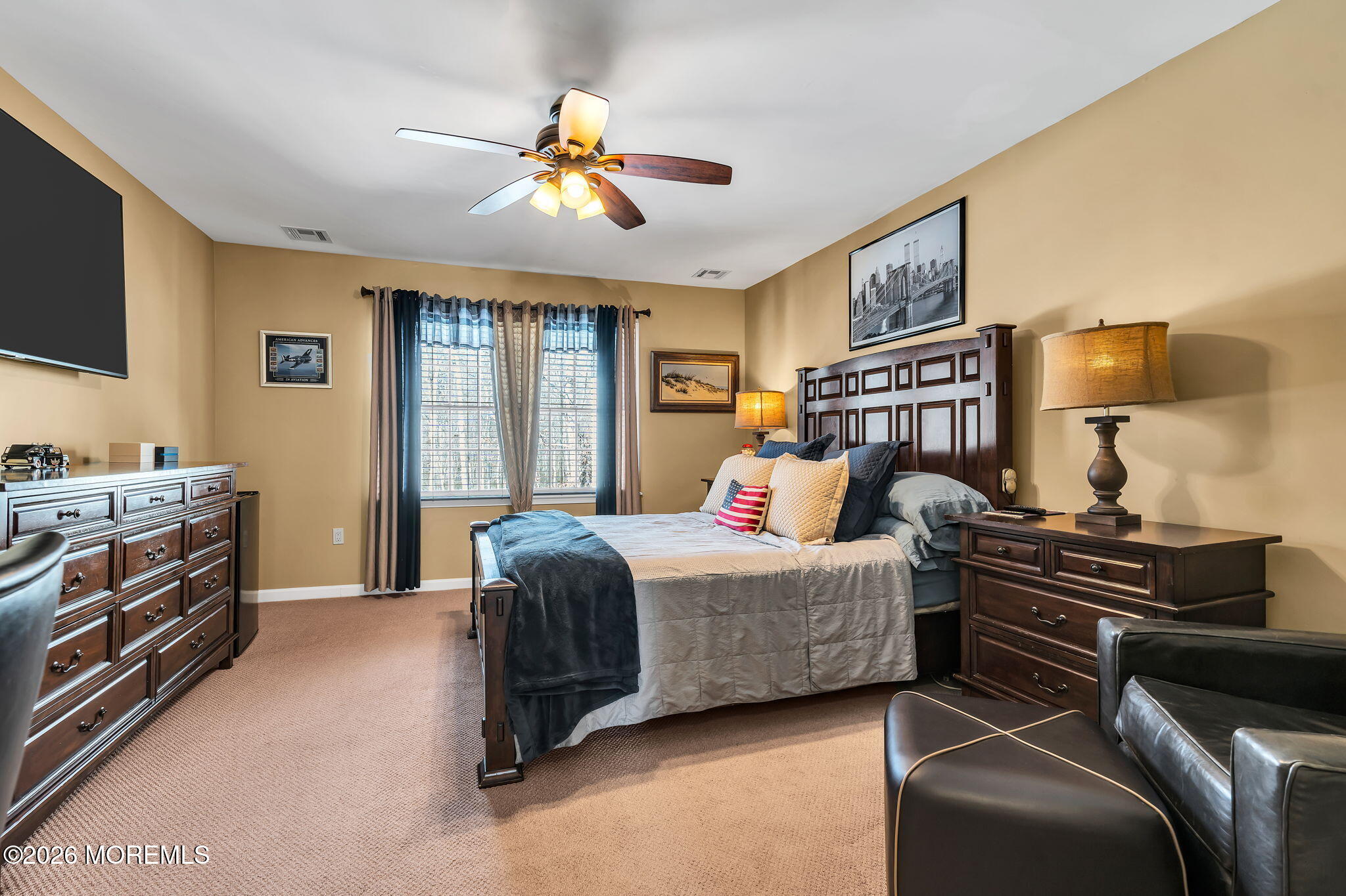 24 Parkside Drive Jackson, NJ 08527 - Photo 16 of 91 a bedroom with a bed and a flat screen tv