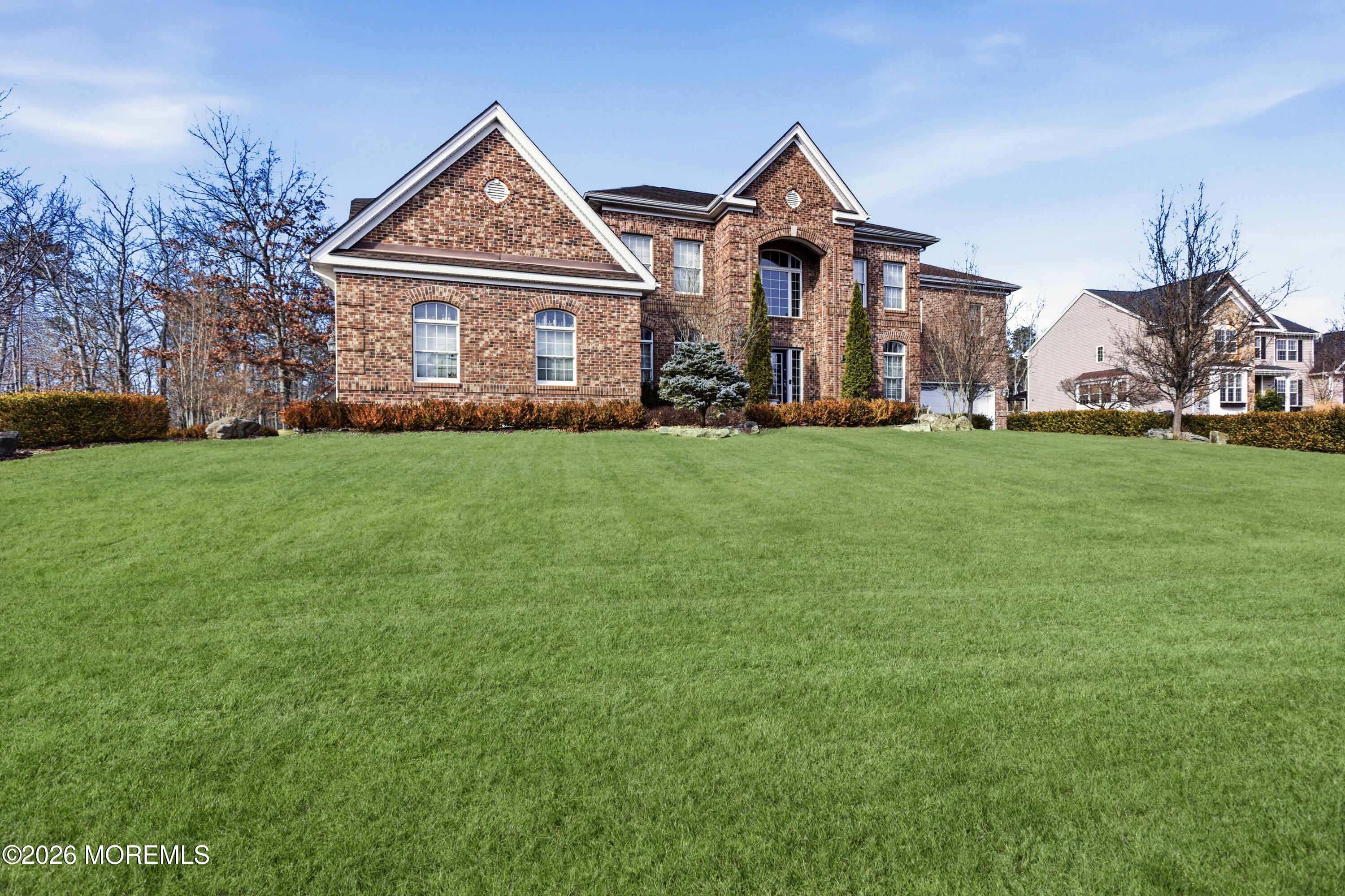 24 Parkside Drive Jackson, NJ 08527 - Photo 19 of 91 a front view of a house with a yard and garage