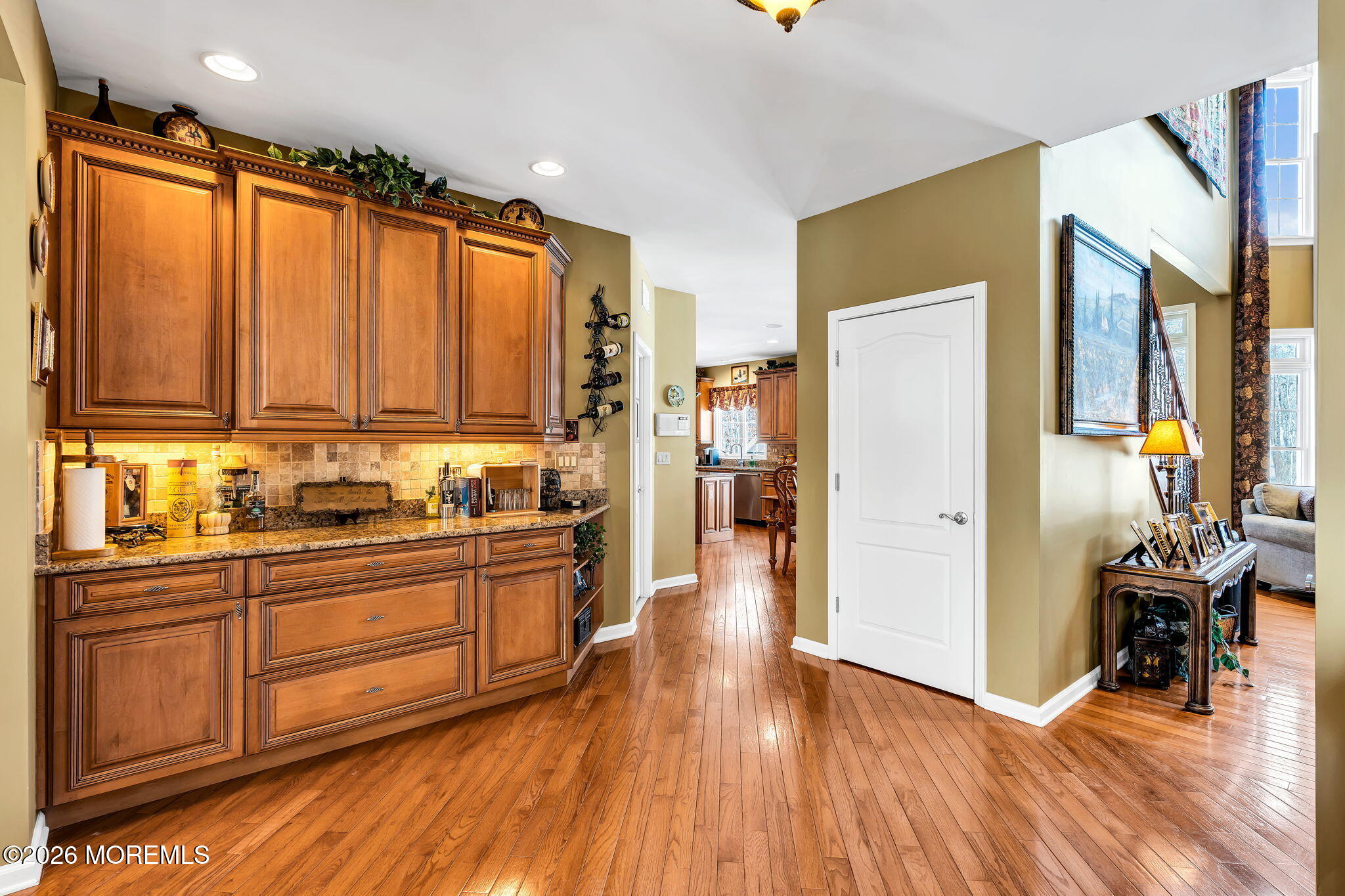 24 Parkside Drive Jackson, NJ 08527 - Photo 20 of 91 a view of a kitchen with kitchen island wooden floors stainless steel appliances and furniture
