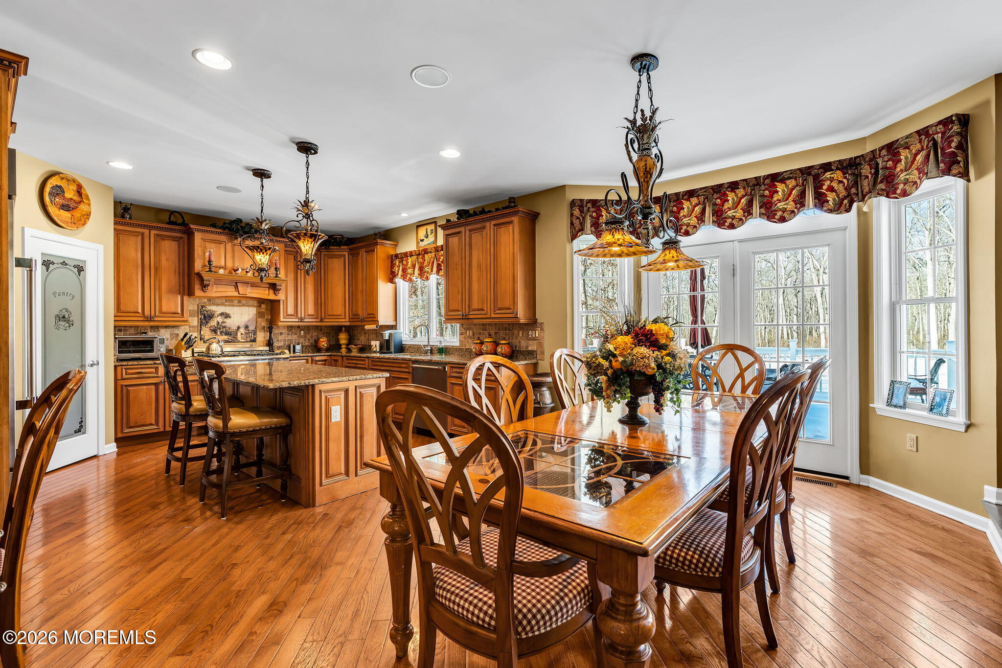 24 Parkside Drive Jackson, NJ 08527 - Photo 38 of 91 a view of a dining room with furniture window and wooden floor
