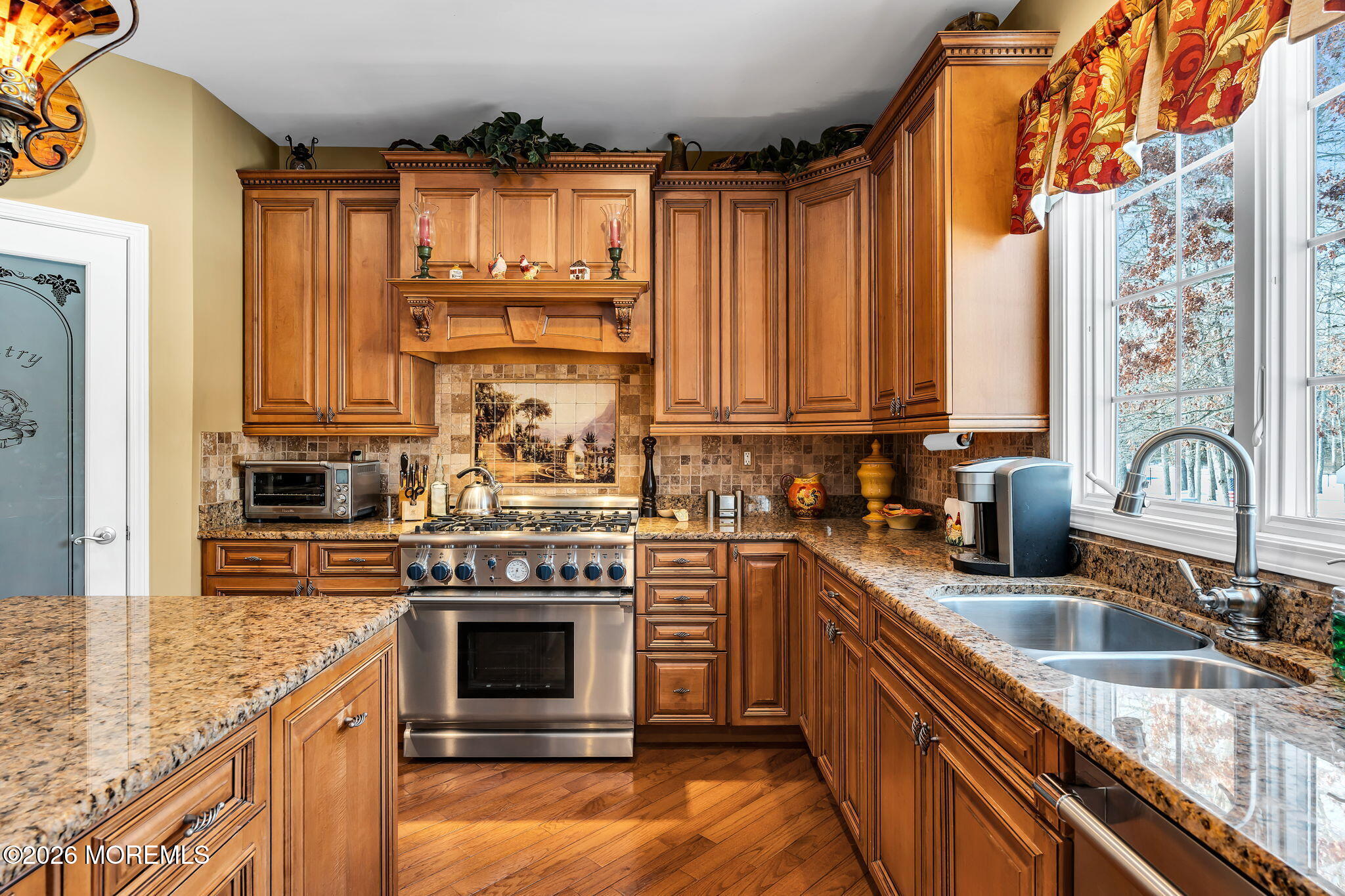 24 Parkside Drive Jackson, NJ 08527 - Photo 40 of 91 a kitchen with stainless steel appliances granite countertop a stove a sink and a microwave