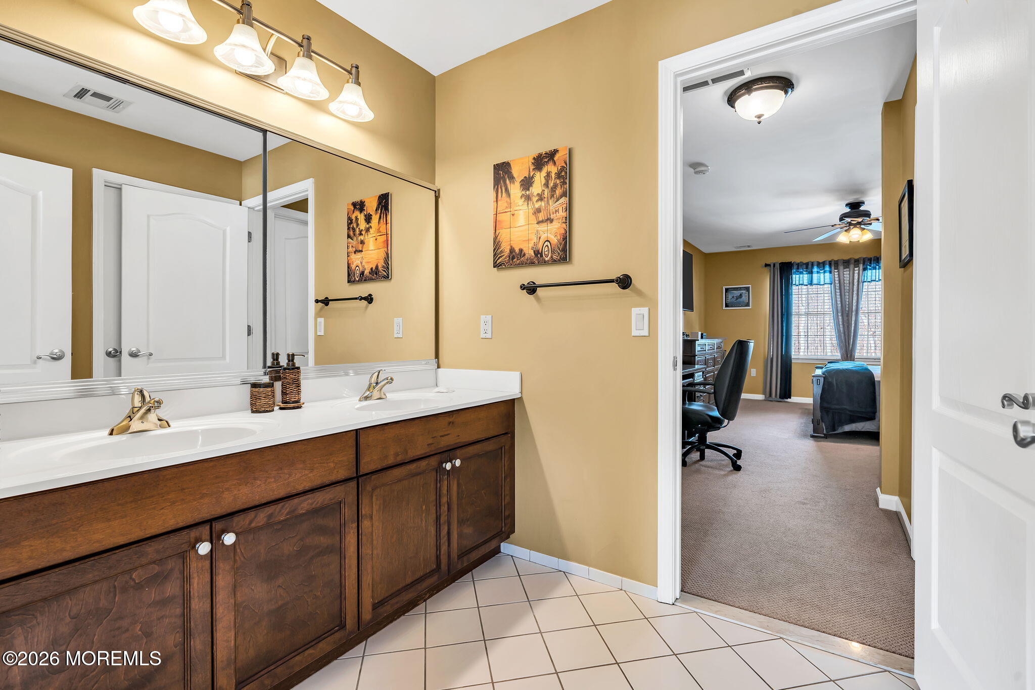 24 Parkside Drive Jackson, NJ 08527 - Photo 52 of 91 a en suite bathroom with a double vanity sink a mirror and a shower