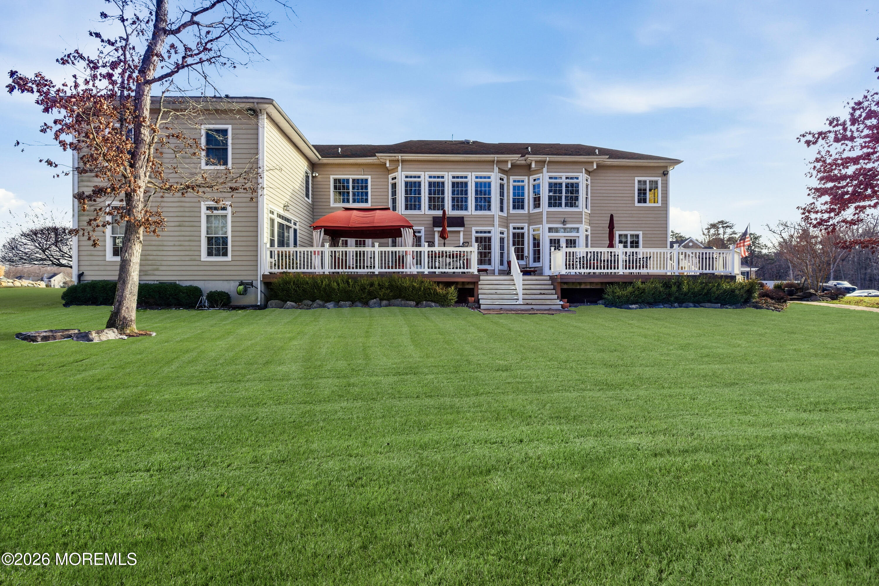 24 Parkside Drive Jackson, NJ 08527 - Photo 75 of 91 a view of a house with a big yard and large trees