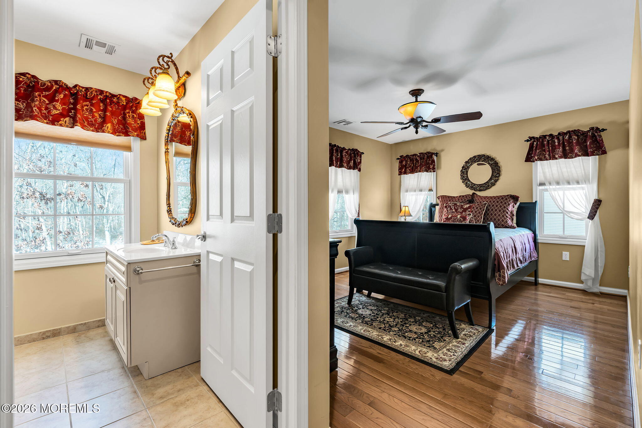 24 Parkside Drive Jackson, NJ 08527 - Photo 83 of 91 a living room with furniture a fireplace and a chandelier