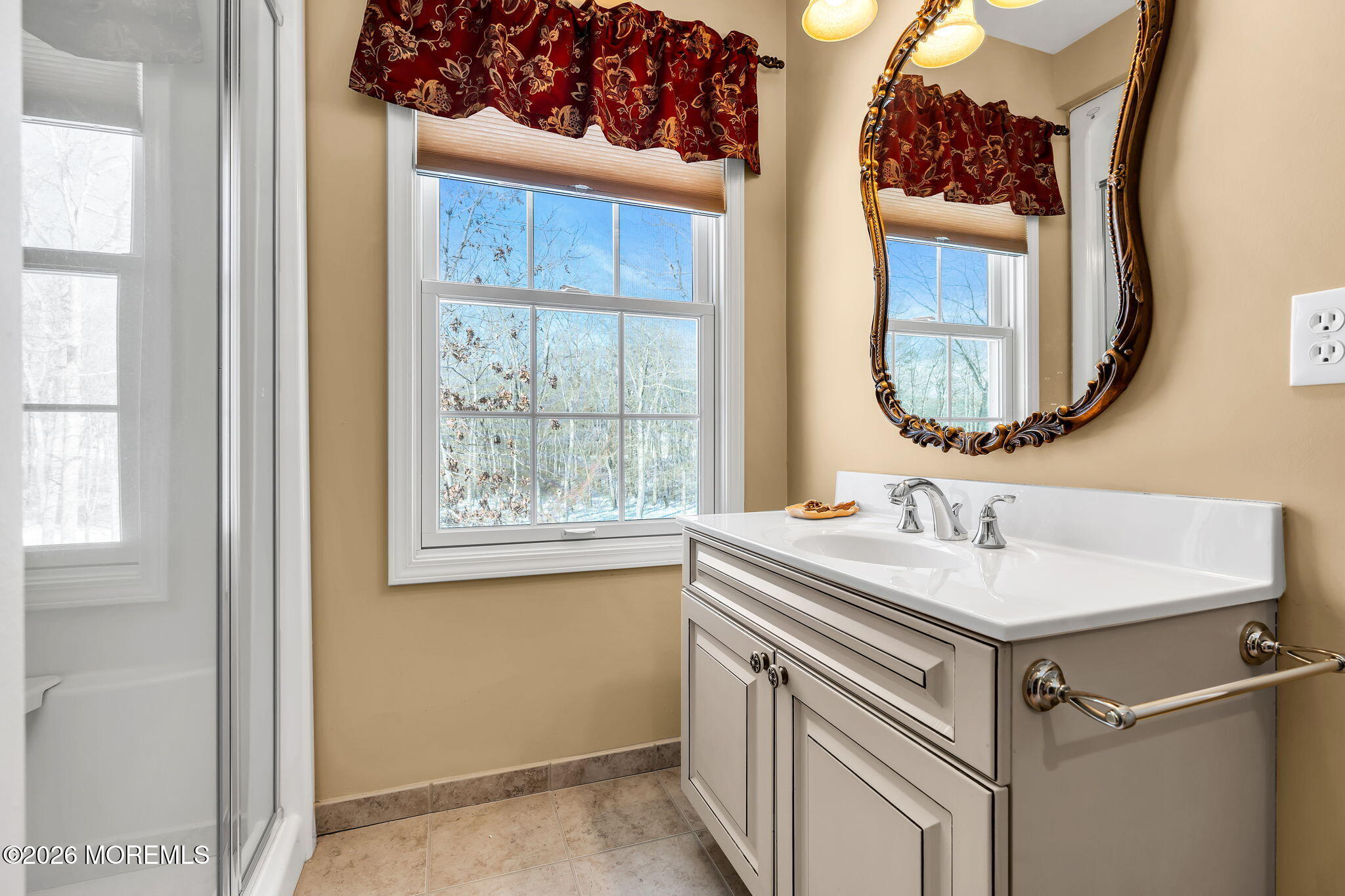 24 Parkside Drive Jackson, NJ 08527 - Photo 84 of 91 a bathroom with a sink and a mirror