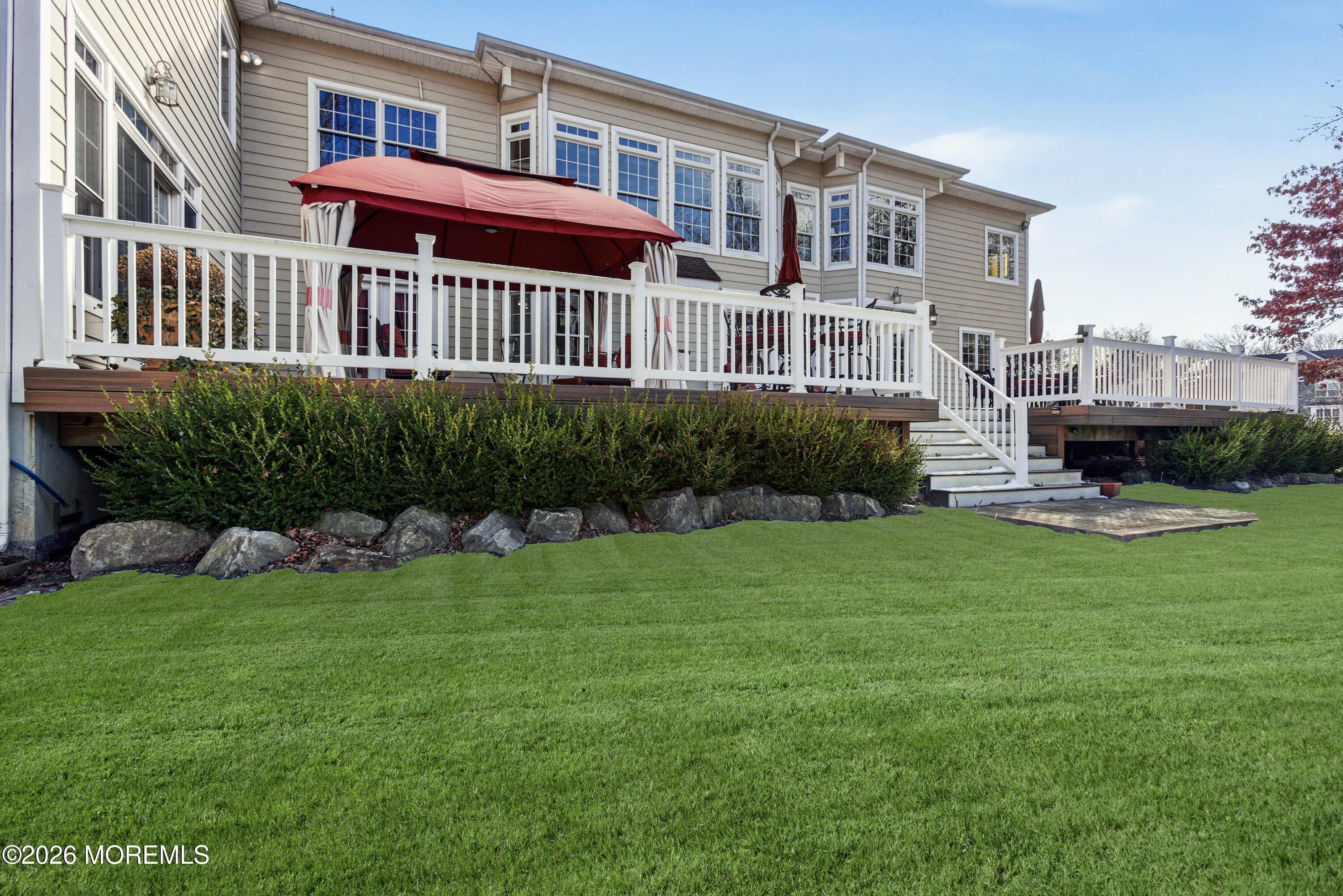 24 Parkside Drive Jackson, NJ 08527 - Photo 89 of 91 a front view of a house with a yard and green space