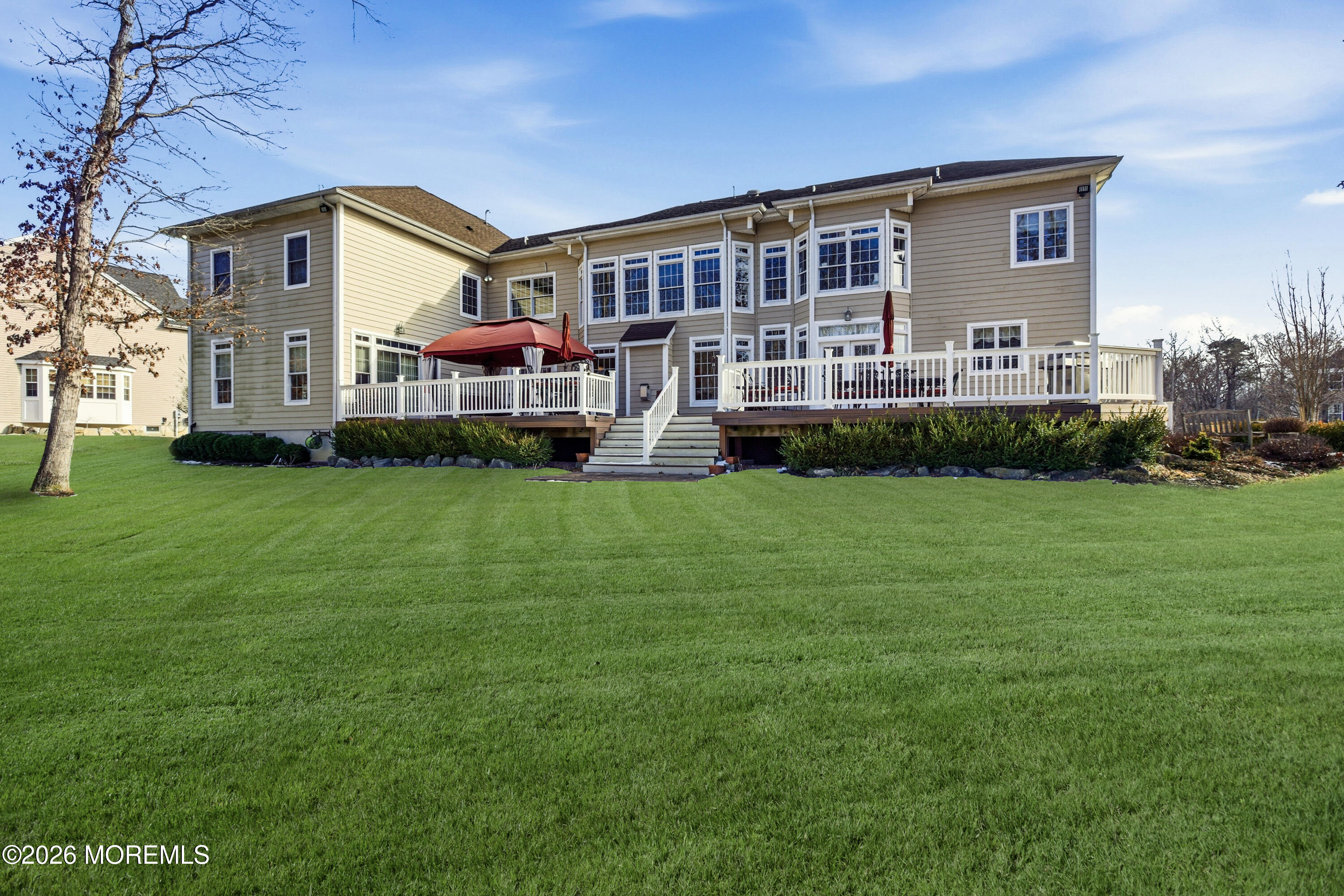 24 Parkside Drive Jackson, NJ 08527 - Photo 89 of 91 a front view of house with yard and green space