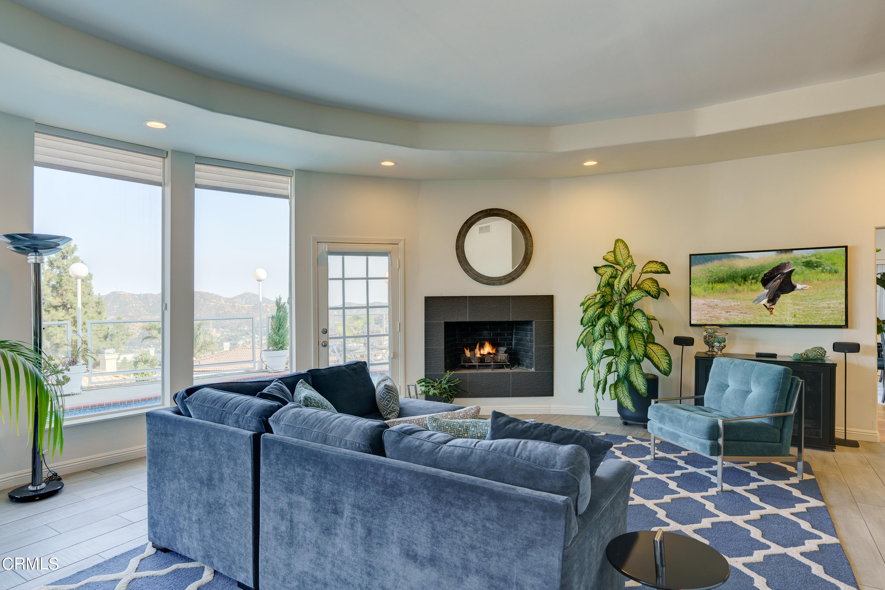 3336 Stephens Circle Glendale, CA 91208 - Photo 23 of 74 a living room with furniture a window and a fireplace