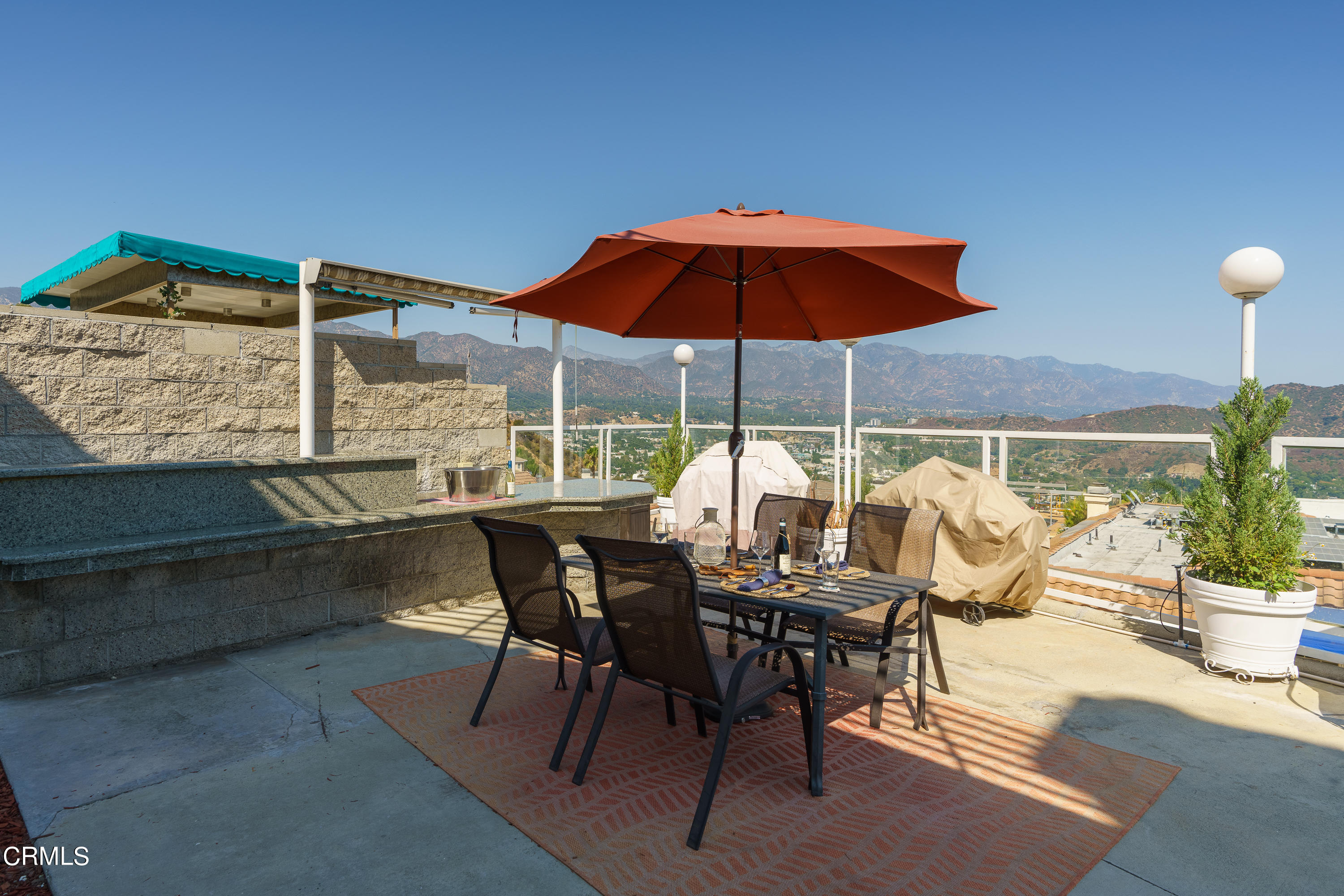 3336 Stephens Circle Glendale, CA 91208 - Photo 30 of 74 a view of an outdoor space with furniture and umbrella