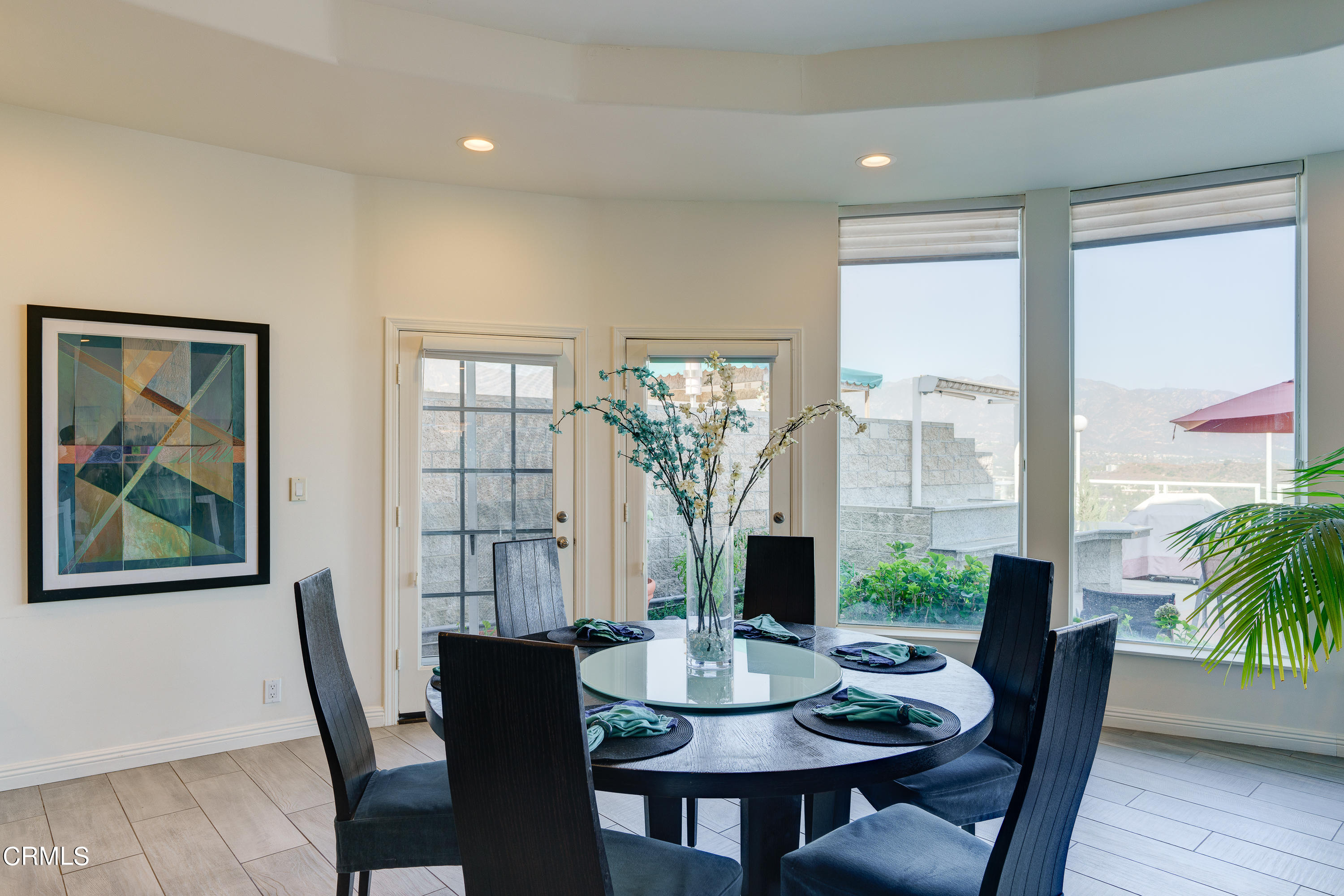 3336 Stephens Circle Glendale, CA 91208 - Photo 32 of 74 a view of a dining room with furniture window and wooden floor
