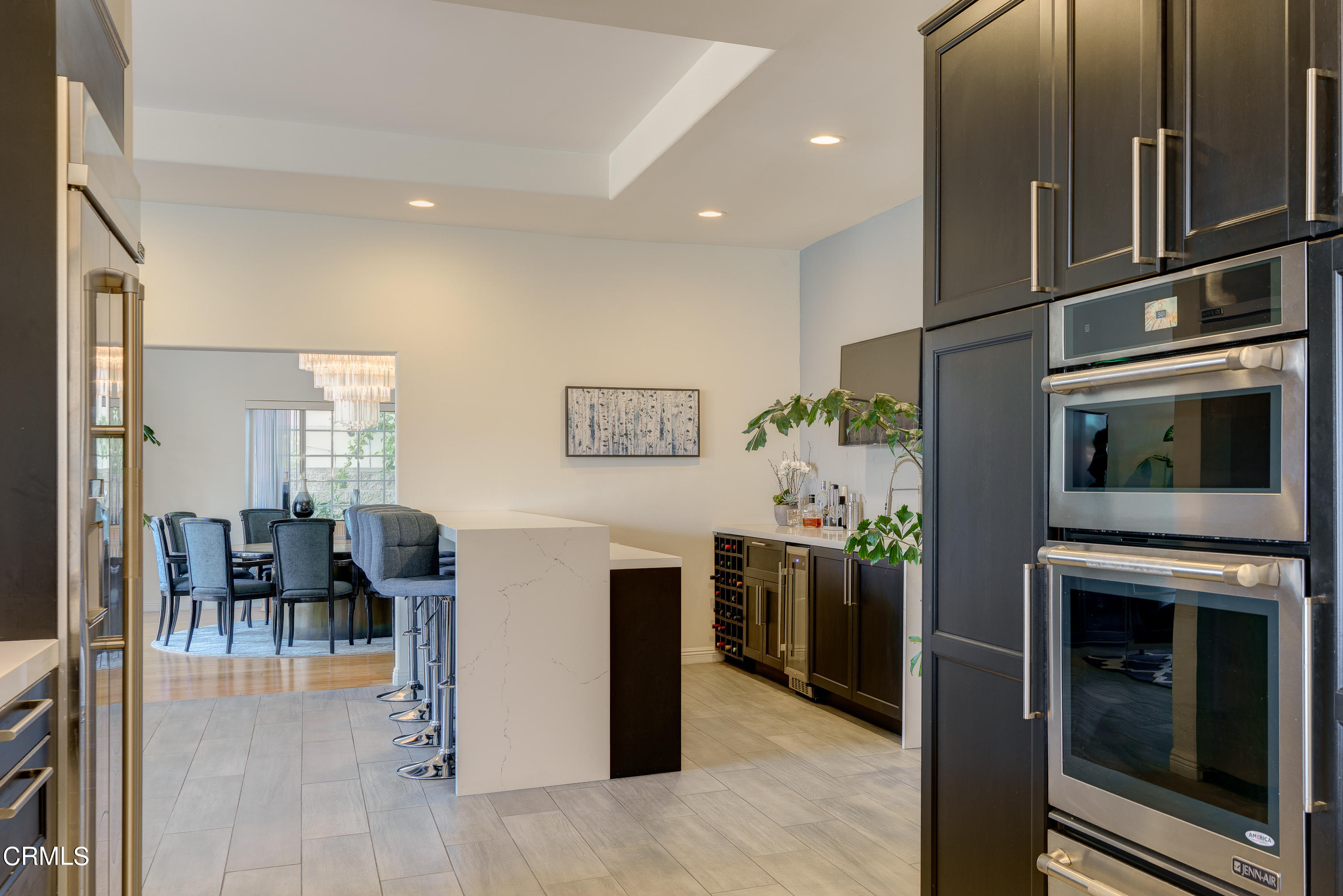 3336 Stephens Circle Glendale, CA 91208 - Photo 38 of 74 a kitchen with stainless steel appliances granite countertop a refrigerator and stove top oven