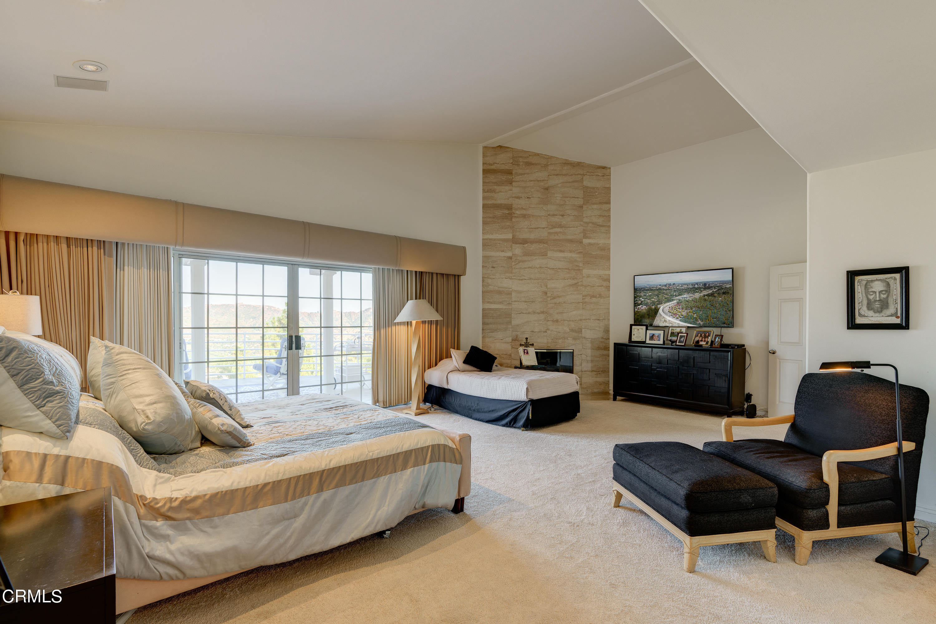 3336 Stephens Circle Glendale, CA 91208 - Photo 46 of 74 a spacious bedroom with a bed couch and window