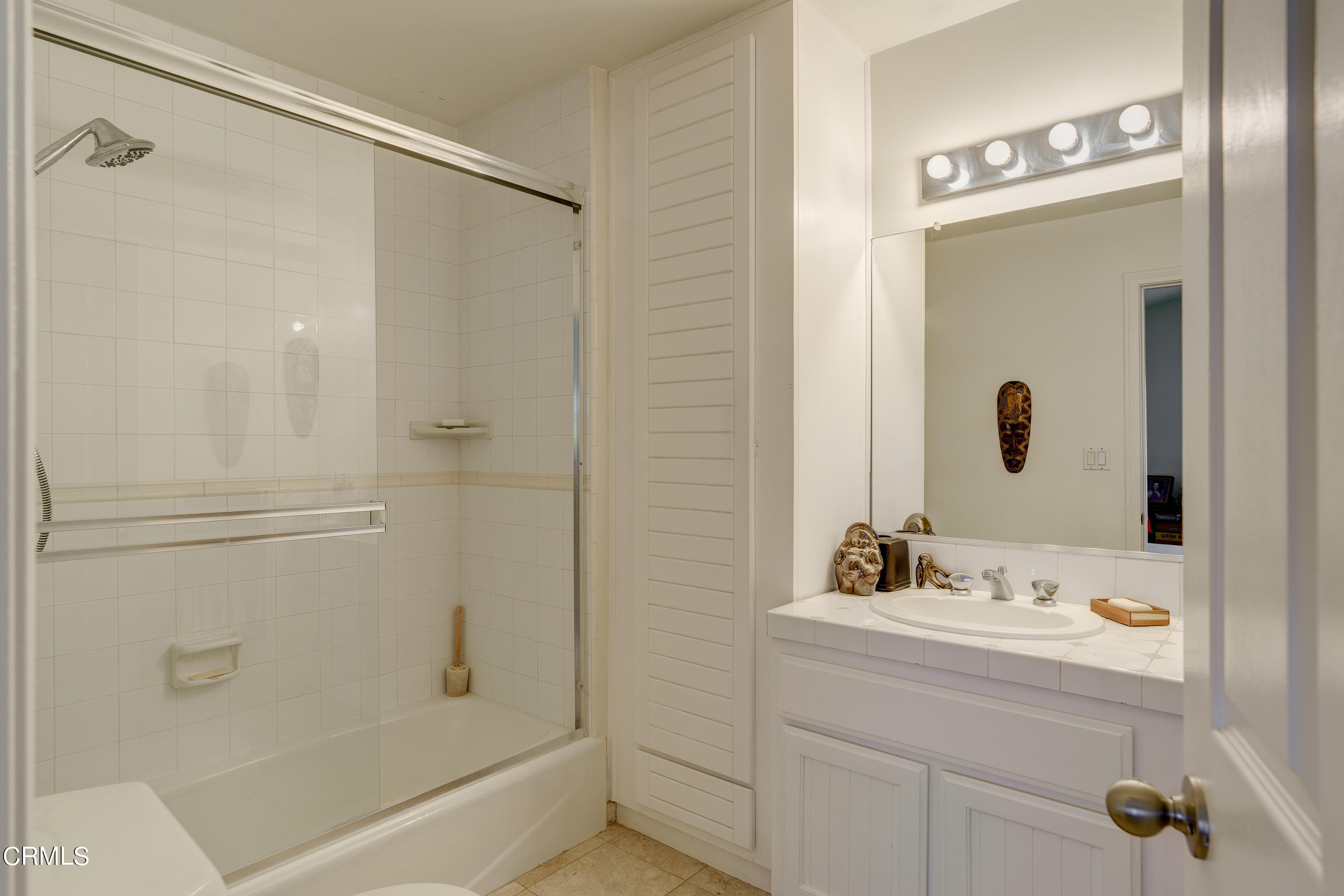 3336 Stephens Circle Glendale, CA 91208 - Photo 60 of 74 a bathroom with a shower and a sink